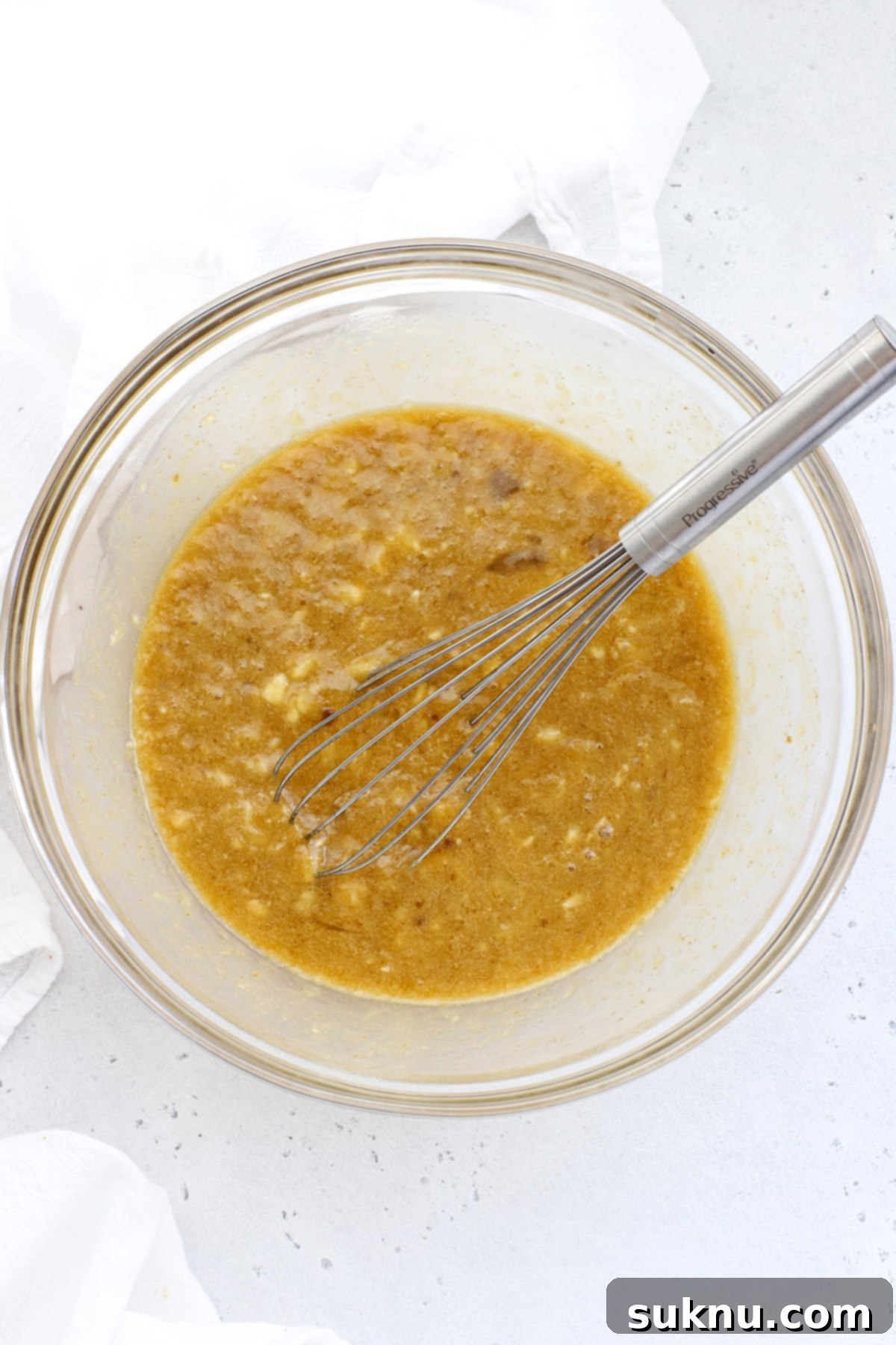 Decadent Gluten-Free Chocolate Banana Bread 6 A closer look at the thoroughly blended wet ingredients for gluten-free chocolate banana bread, ready for the dry components.