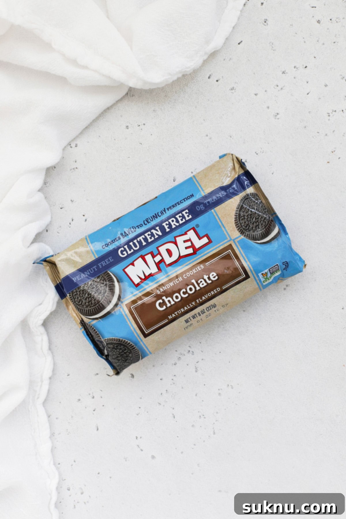 Overhead view of Mi-Del gluten-free chocolate sandwich cookies on a clean white background.