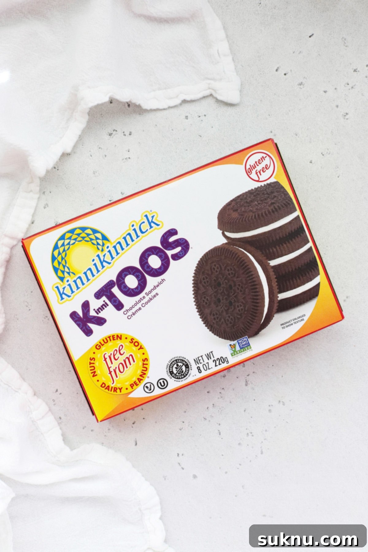 Kinnikinnick K-Toos gluten-free chocolate sandwich cookies, showcasing their unique packaging.