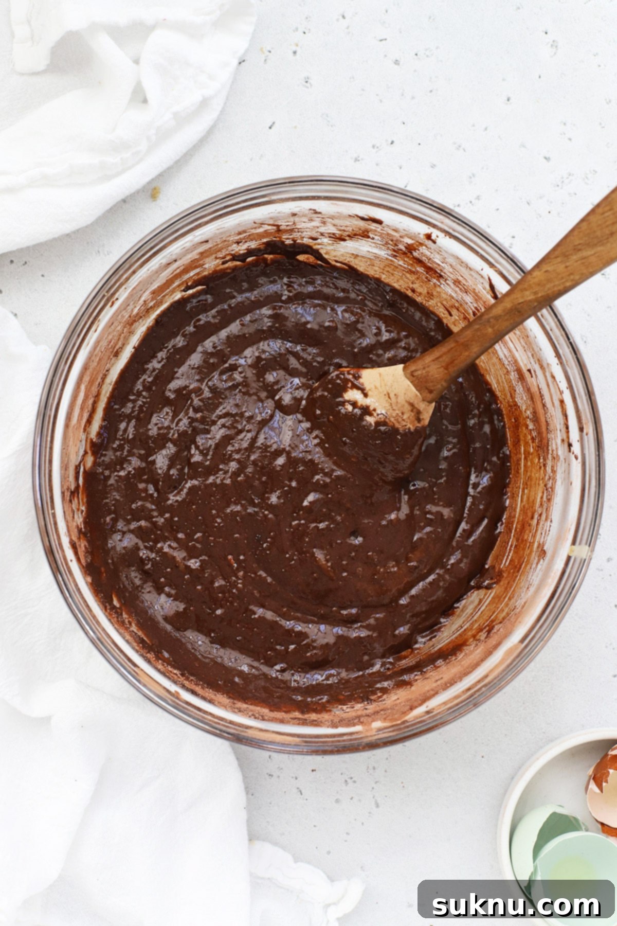 Smooth, rich gluten-free brownie cookies batter in a bowl.