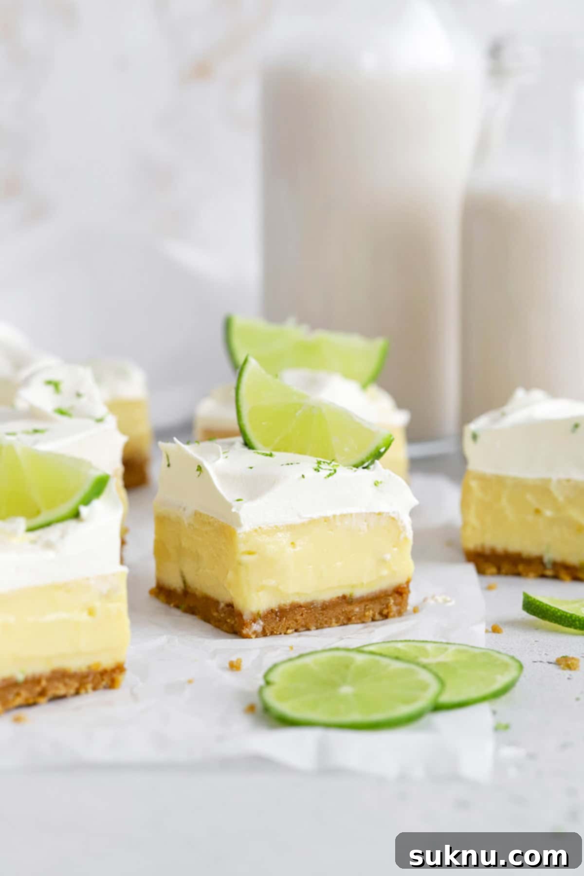Front view of gluten-free key lime pie bars with gluten-free graham cracker crust