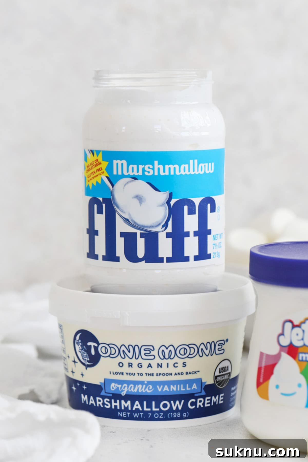 Front view of three brands of gluten-free marshmallow fluff/marshmallow creme