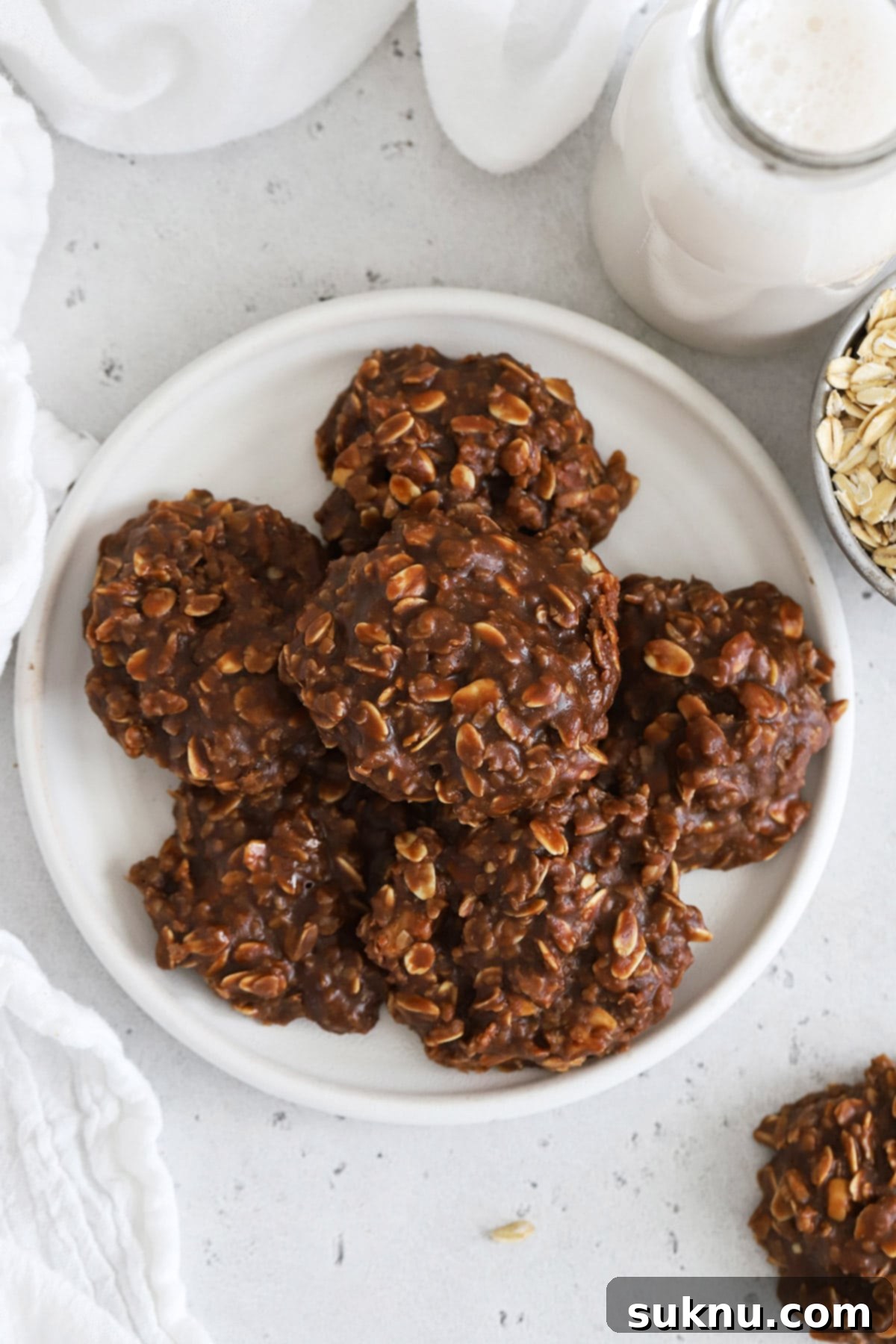 A plate full of gluten-free chocolate peanut butter no-bake cookies