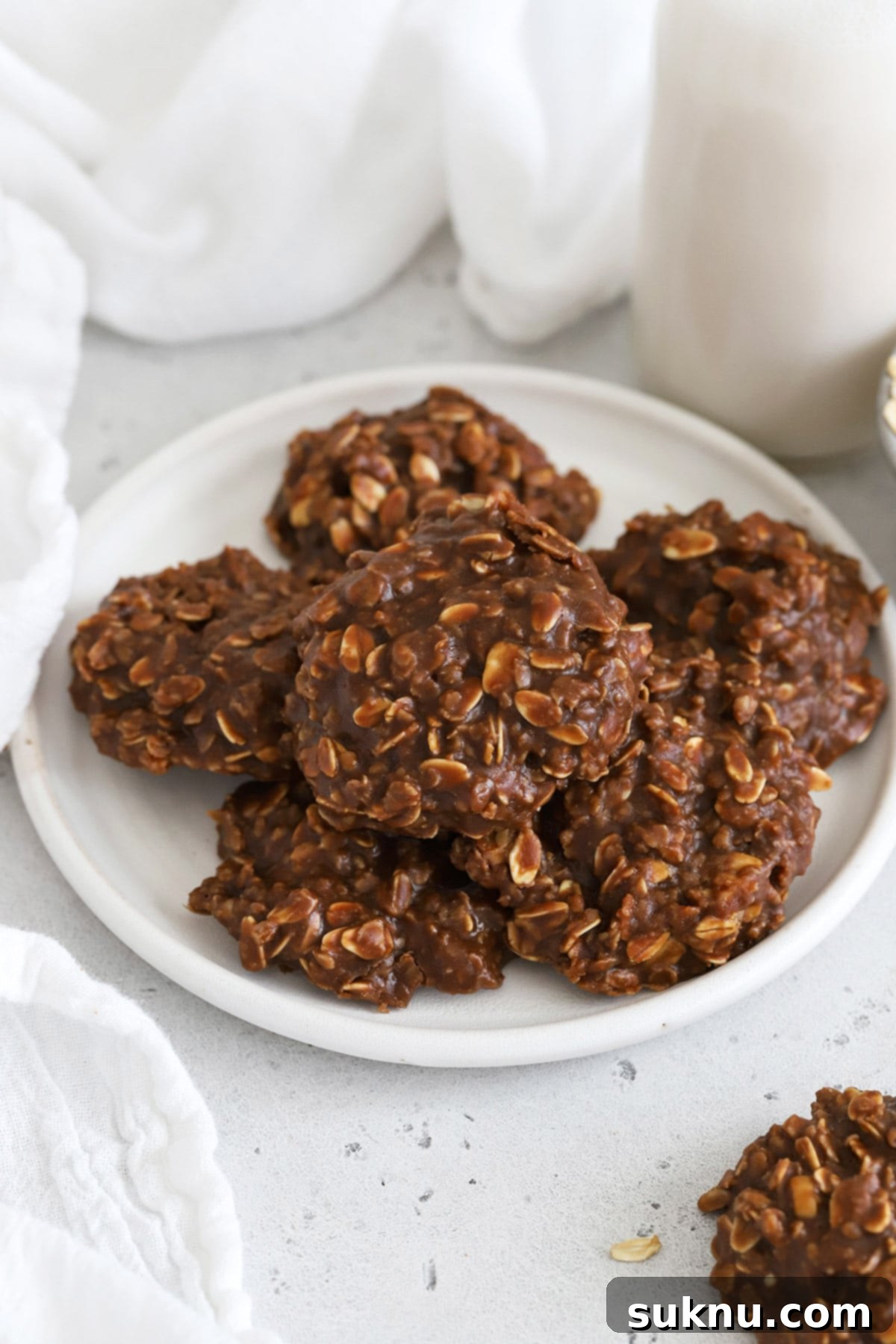 A plate full of gluten-free chocolate peanut butter no-bake cookies