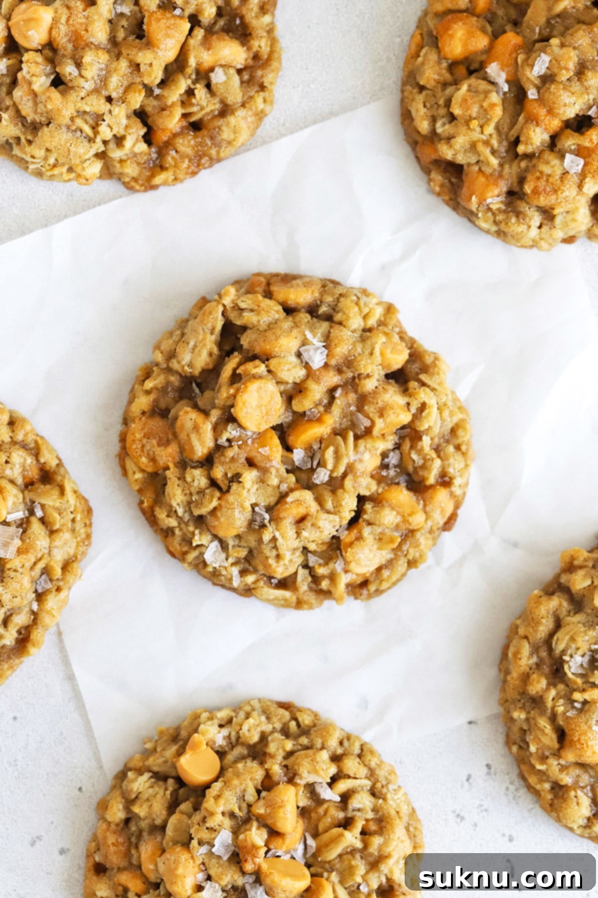 Gluten-free oatmeal butterscotch cookies topped with flaky sea salt