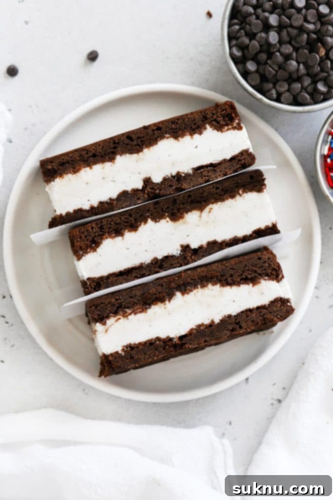 Overhead view of three gluten free ice cream sandwiches on a plate