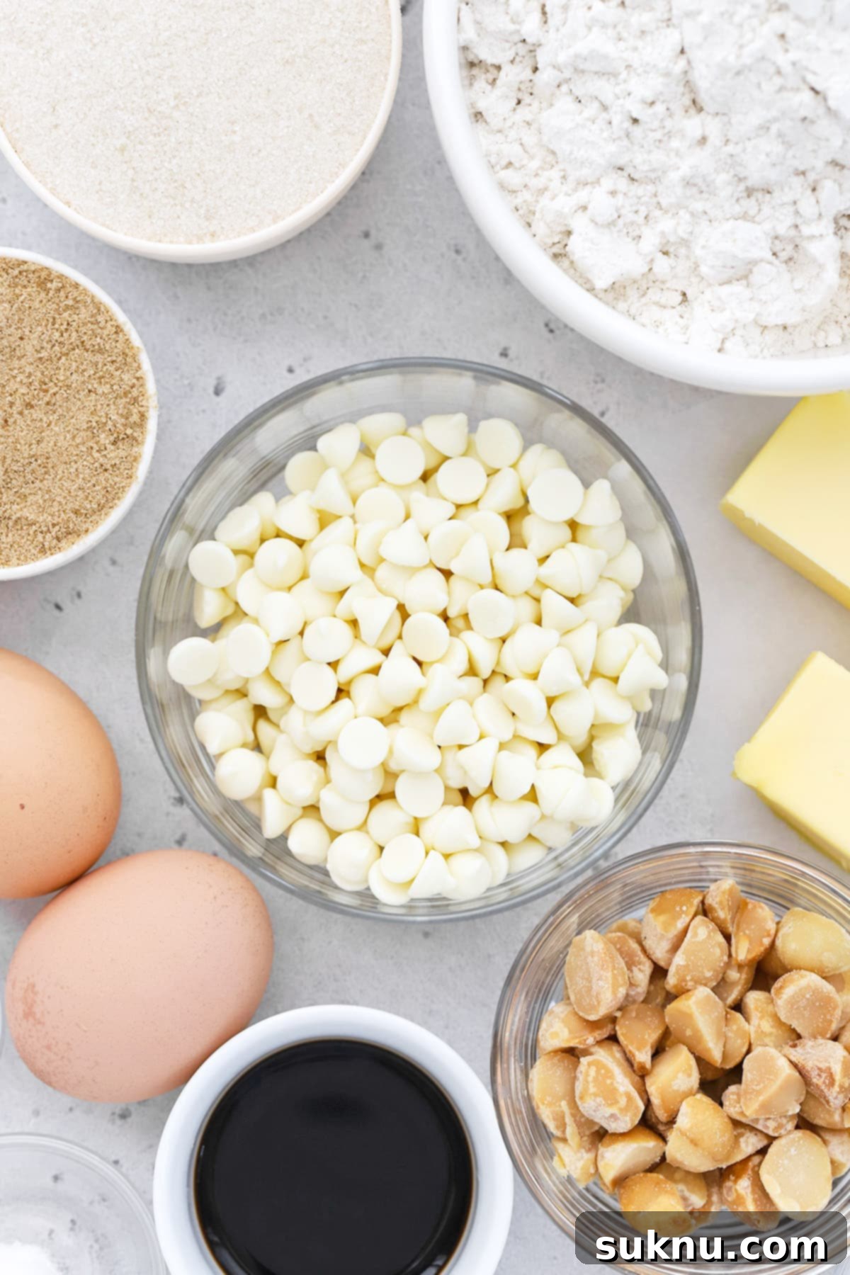 Overhead view of ingredients for gluten-free white chocolate chip macadamia nut cookies