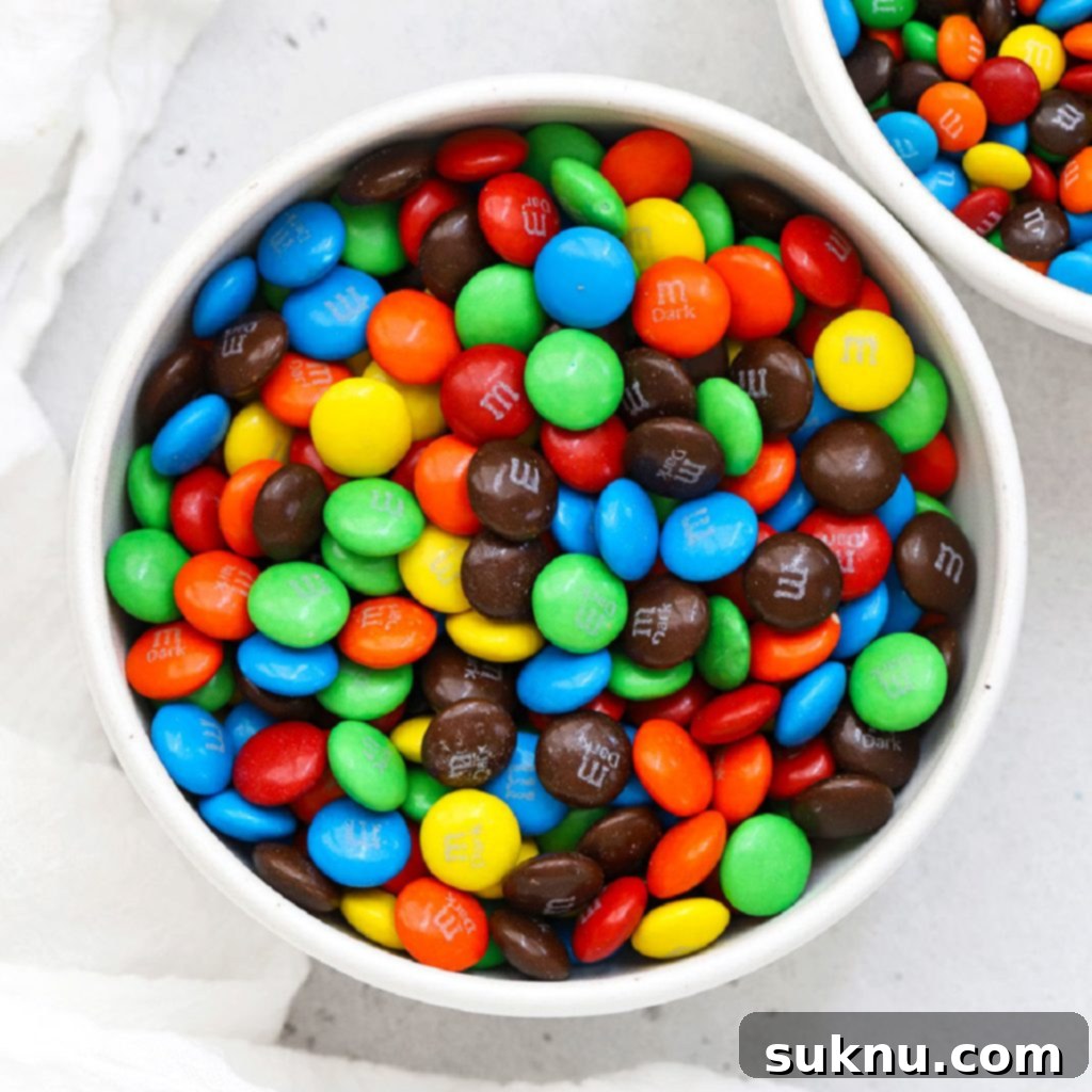 overhead view of a bowl of colorful m&ms
