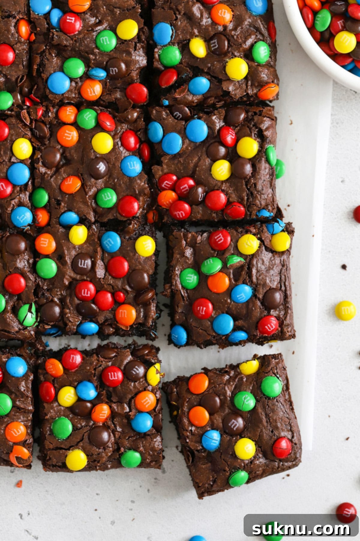 Overhead view of easy gluten-free M&M brownies cut into squares