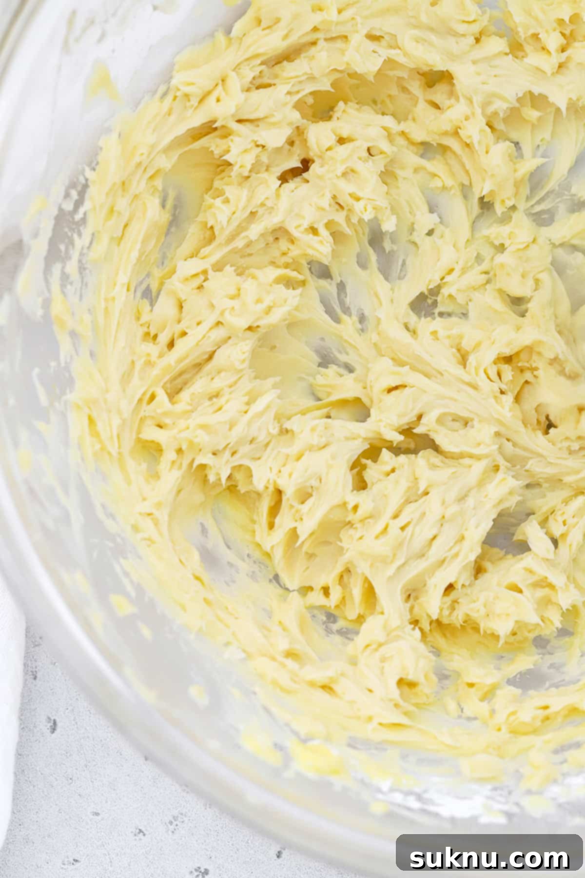 Fluffy Honey Butter Made in Minutes 6 Continuous beating of homemade honey butter to achieve a fluffy texture