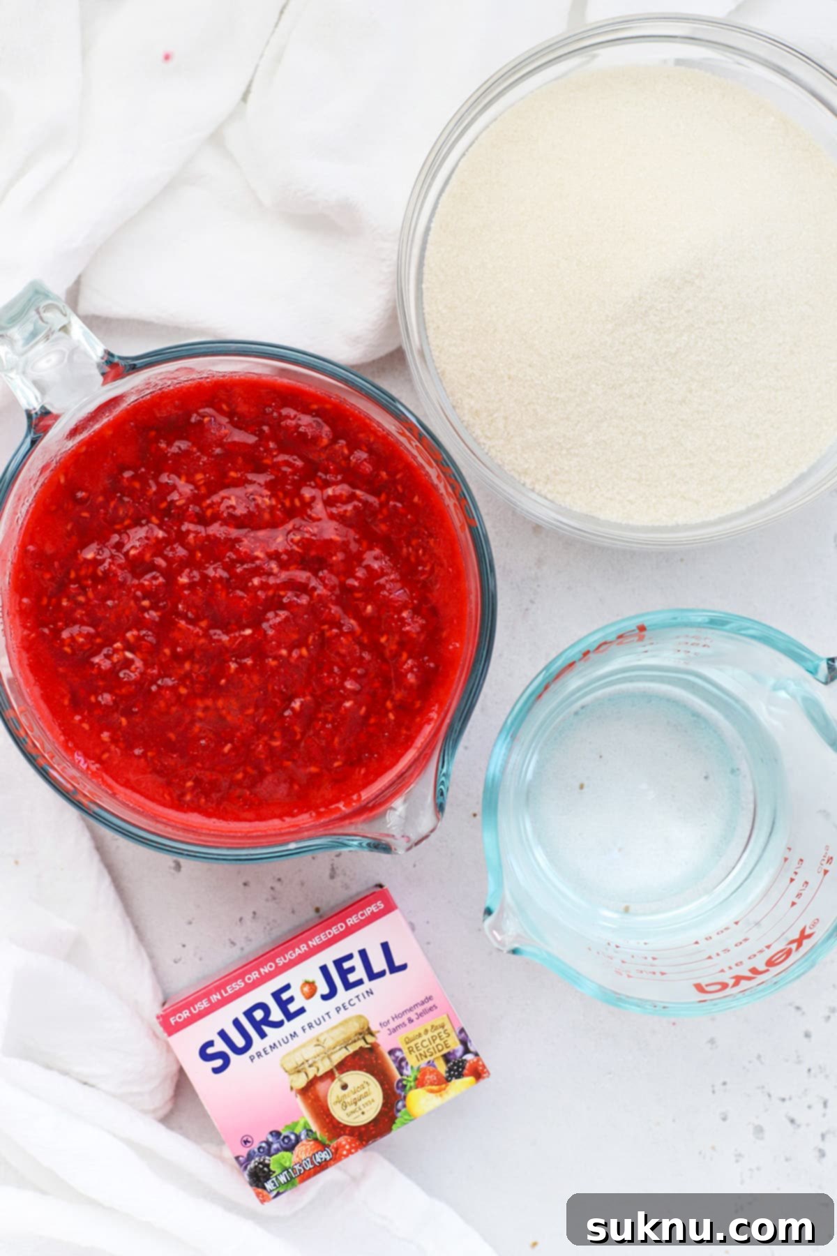 Close-up of fresh raspberries, emphasizing their vibrant color and texture.