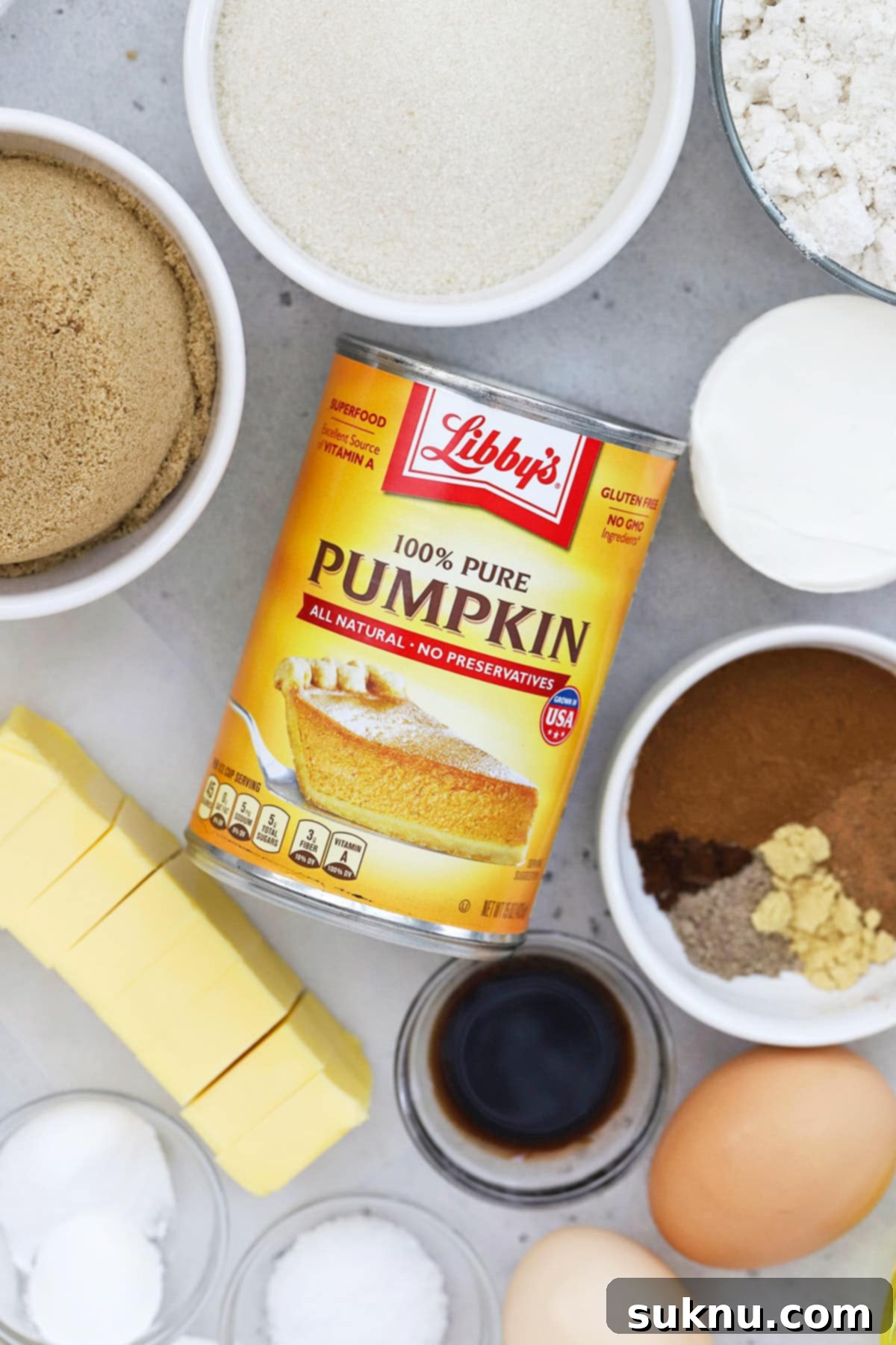 Overhead view of all the simple ingredients needed for gluten-free pumpkin bars.