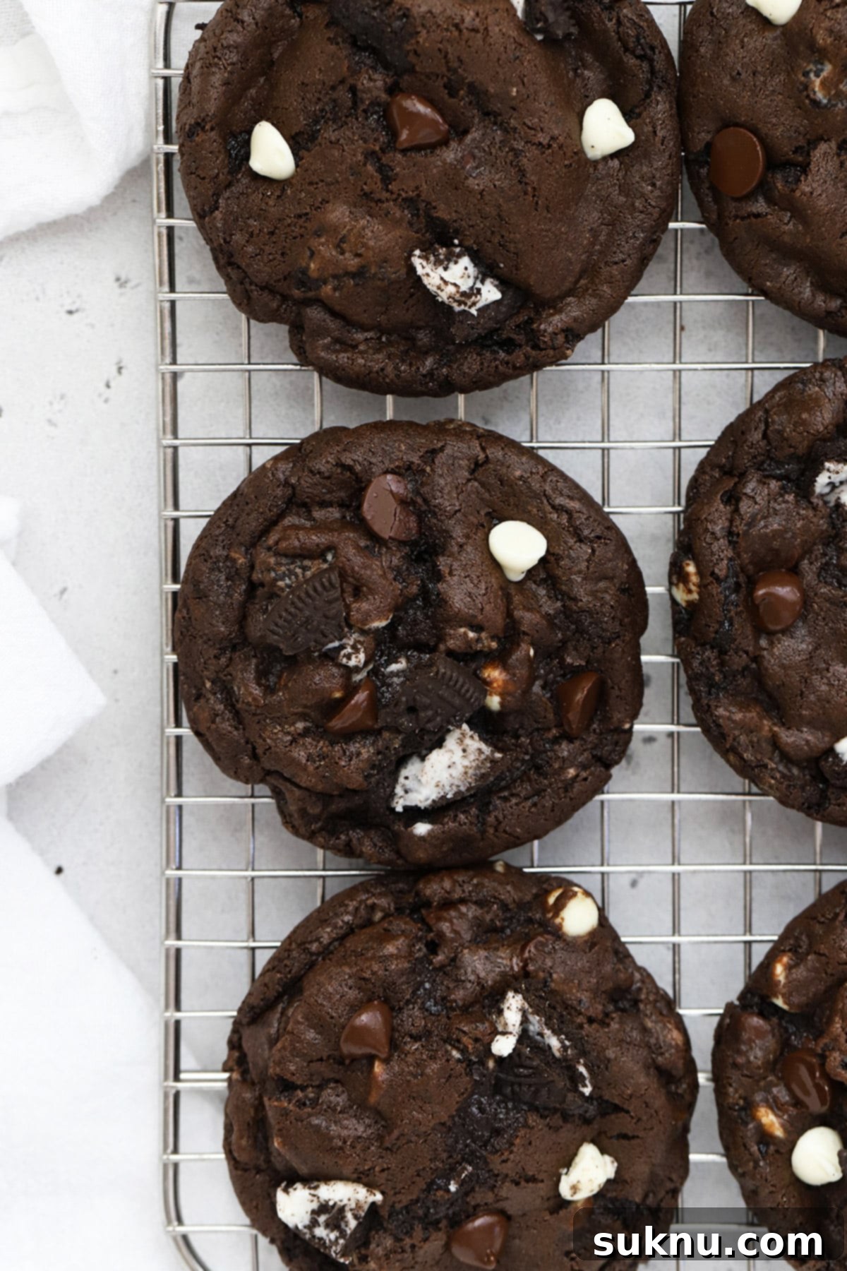 Gluten-Free Chocolate and Cookies & Cream Cookies 8 overhead view of gluten-free chocolate cookies and cream cookies cooling on a wire rack