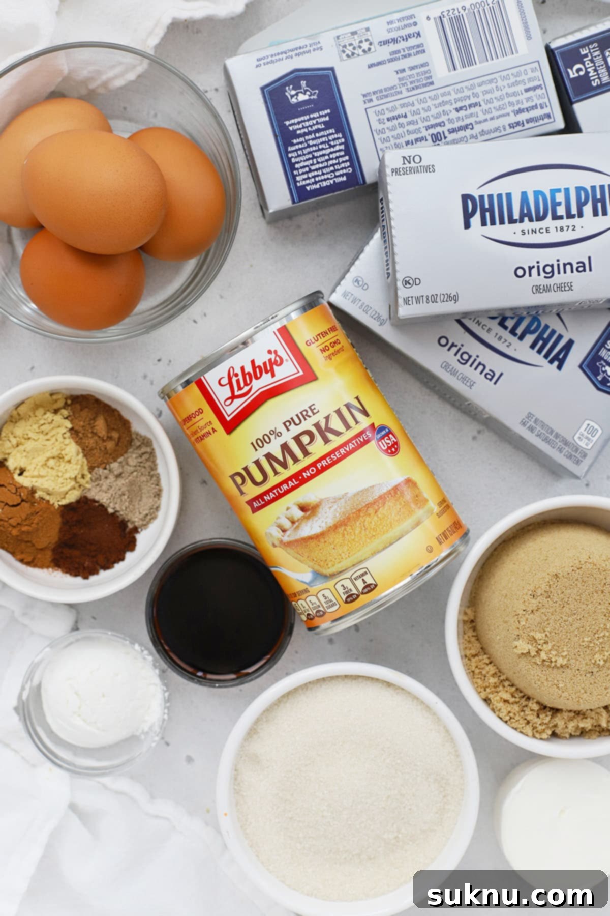 Overhead view of ingredients for gluten-free pumpkin cheesecake
