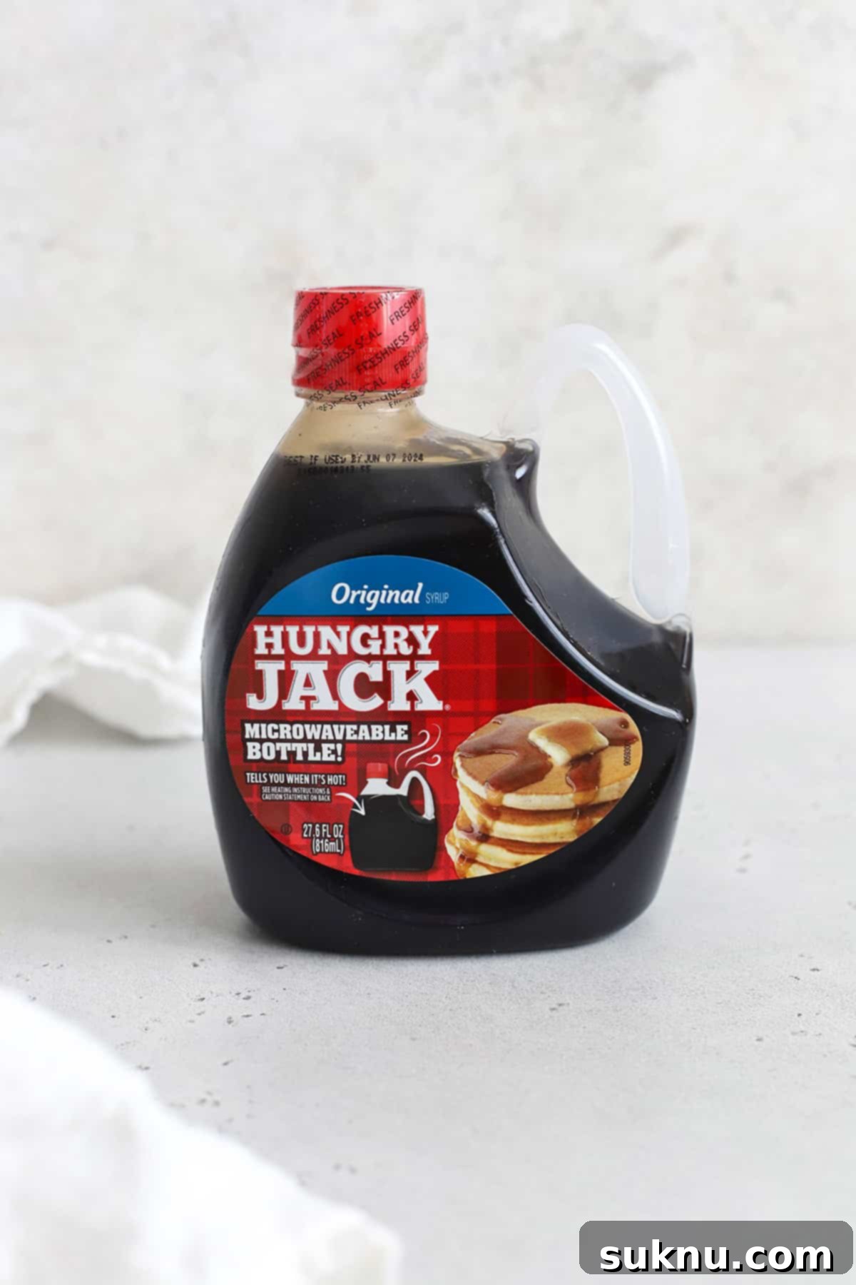 The Gluten-Free Verdict On Maple Syrup 9 Front view of a bottle of Hungry Jack pancake syrup, confirming its gluten-free status.