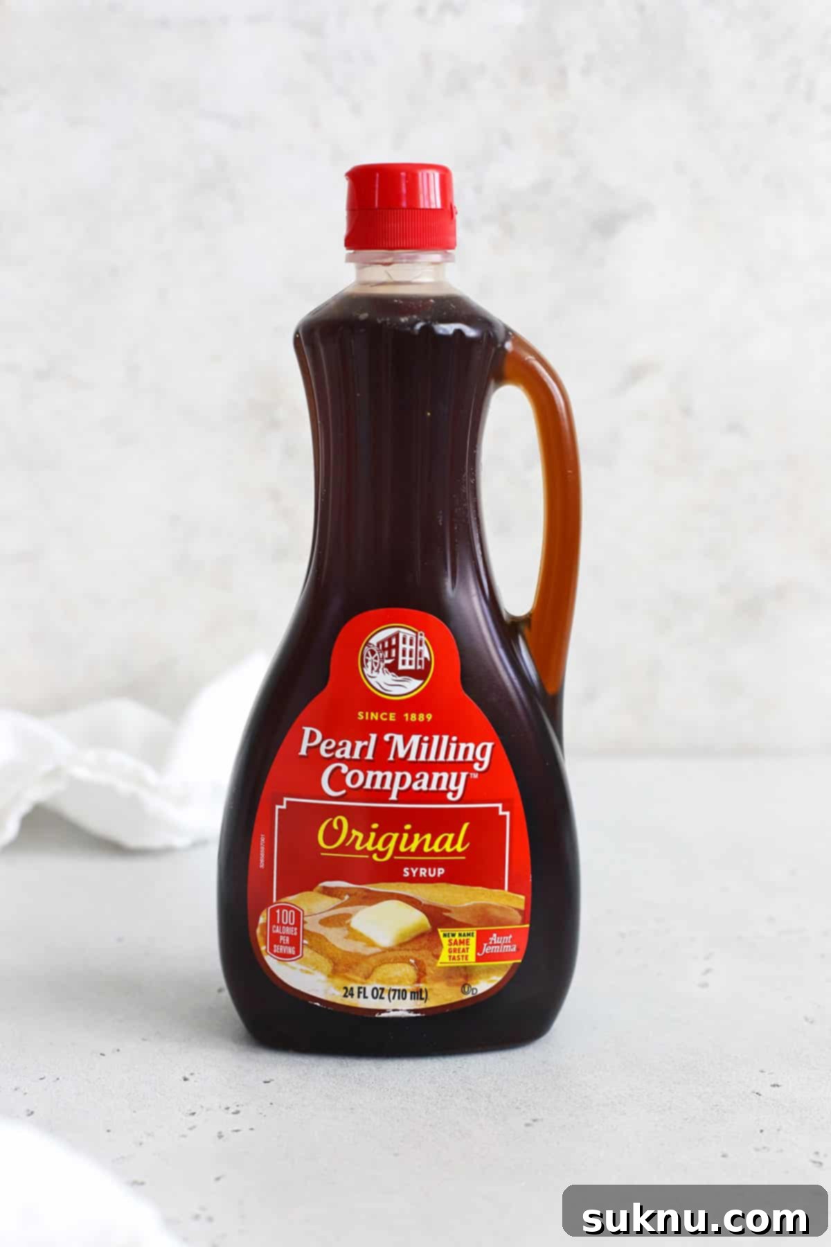 The Gluten-Free Verdict On Maple Syrup 10 Front view of a bottle of Pearl Milling Pancake Syrup, confirming its gluten-free status.