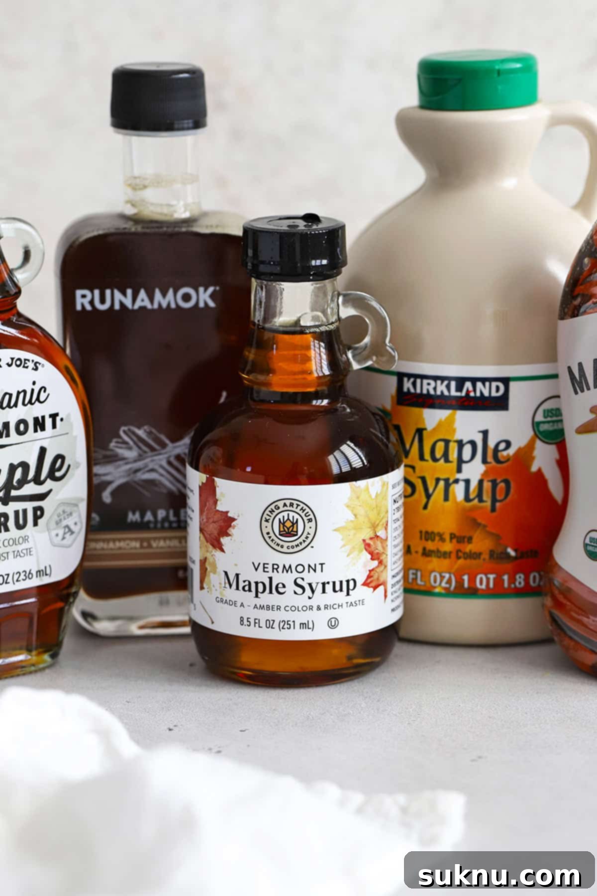 The Gluten-Free Verdict On Maple Syrup 11 Front view of bottles of pure maple syrup, emphasizing natural and gluten-free choice.