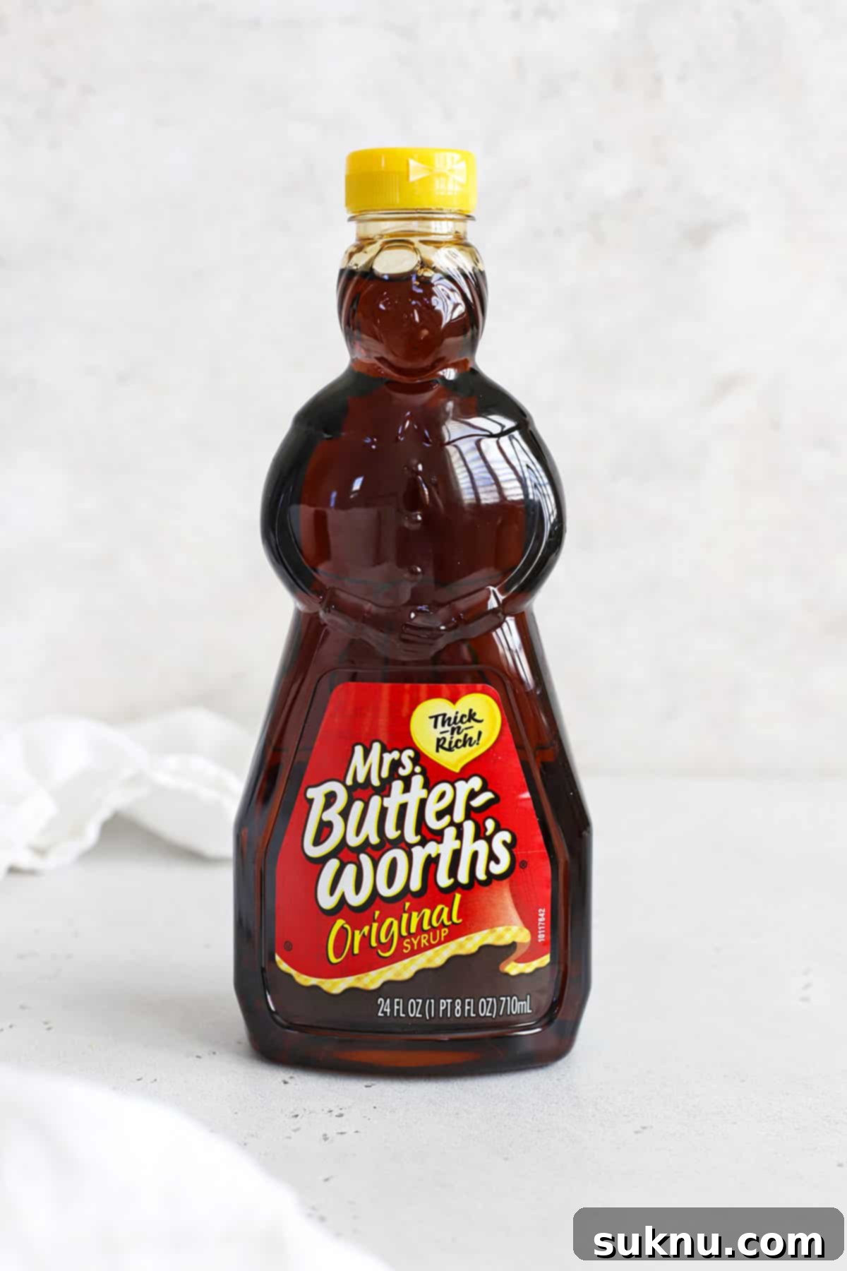 The Gluten-Free Verdict On Maple Syrup 8 Front view of a bottle of Mrs. Butterworth pancake syrup, confirming its gluten-free status.