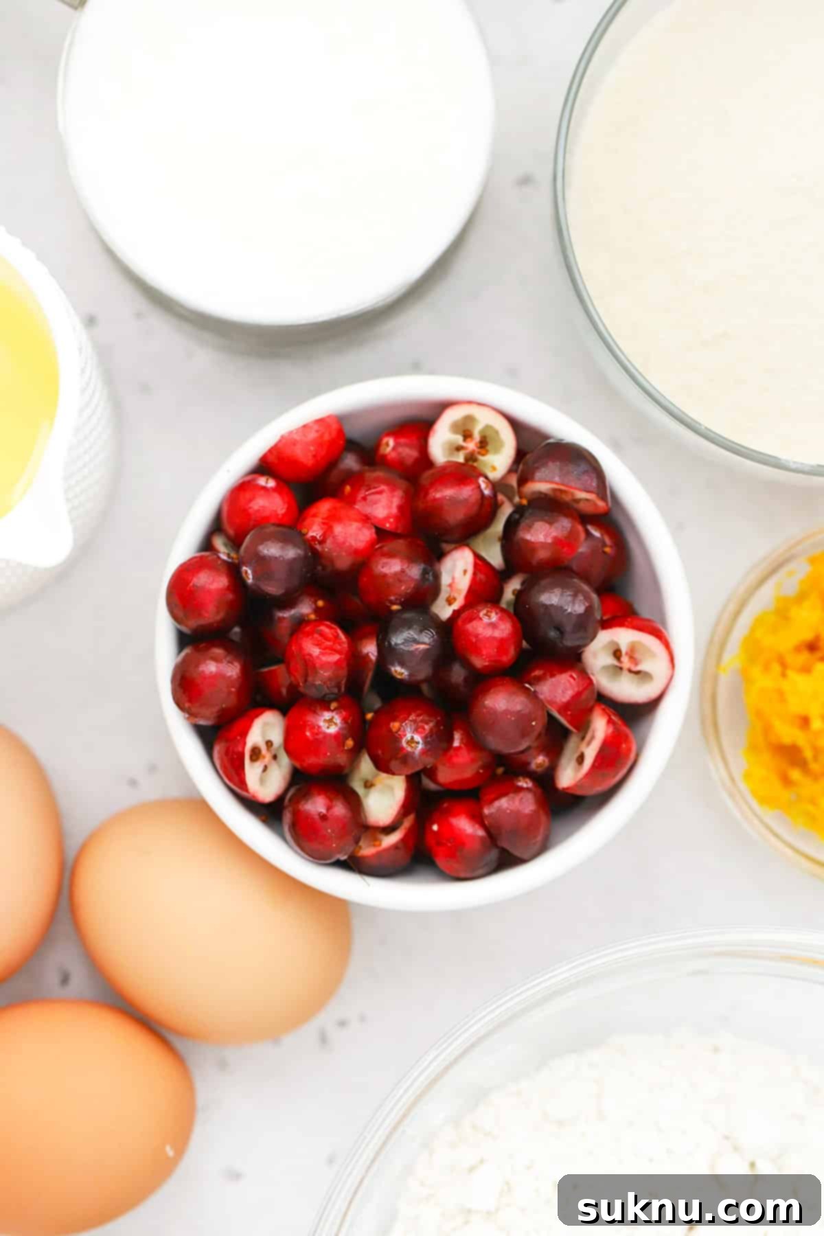 Overhead view of ingredients for gluten-free orange cranberry cake