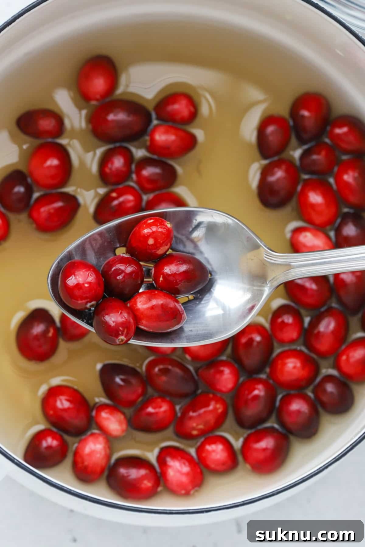 Sparkling Sugared Cranberries 6 Dipping fresh cranberries in simple syrup to make sugared cranberries