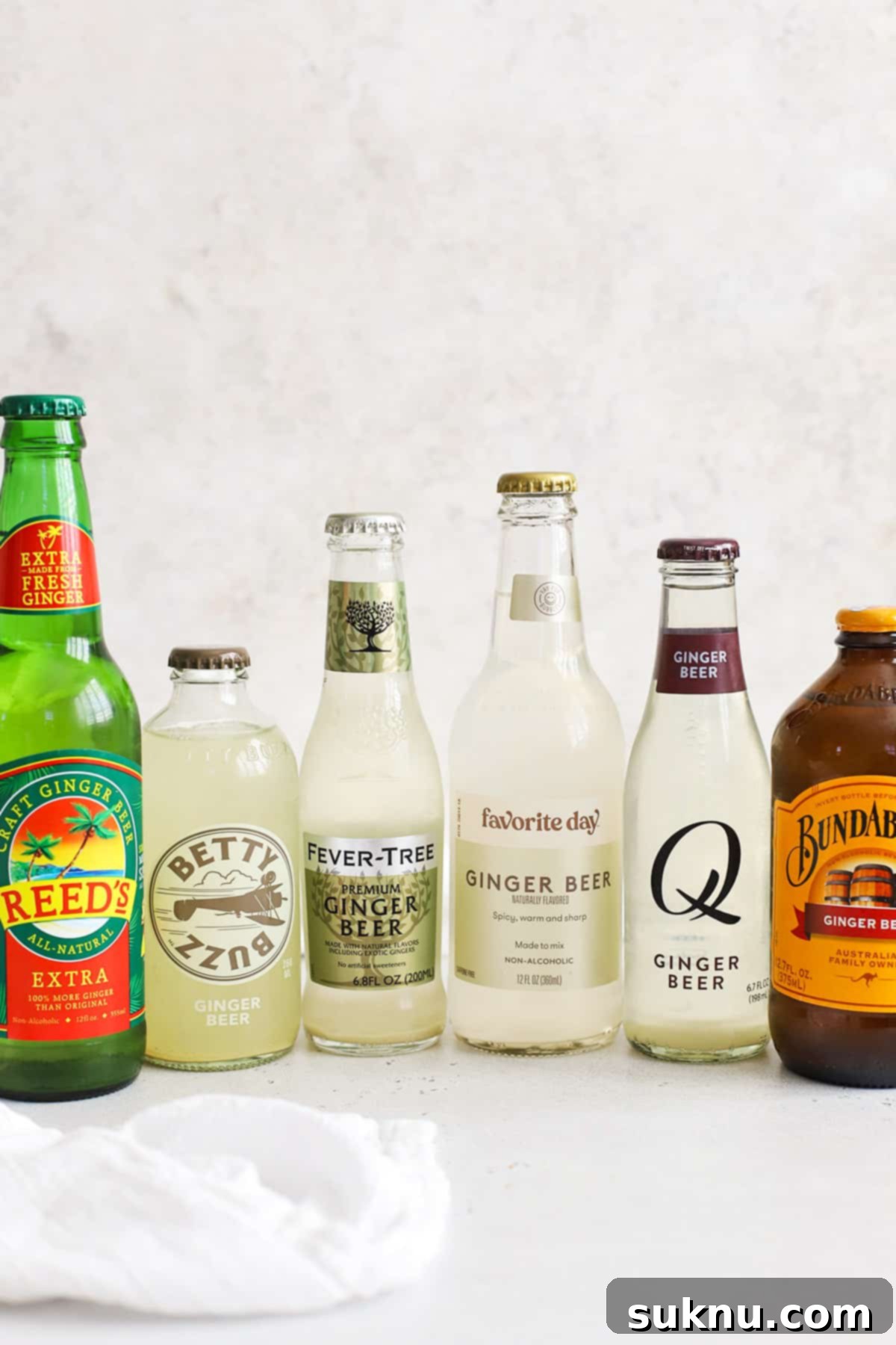 Front view of six brands of ginger beer
