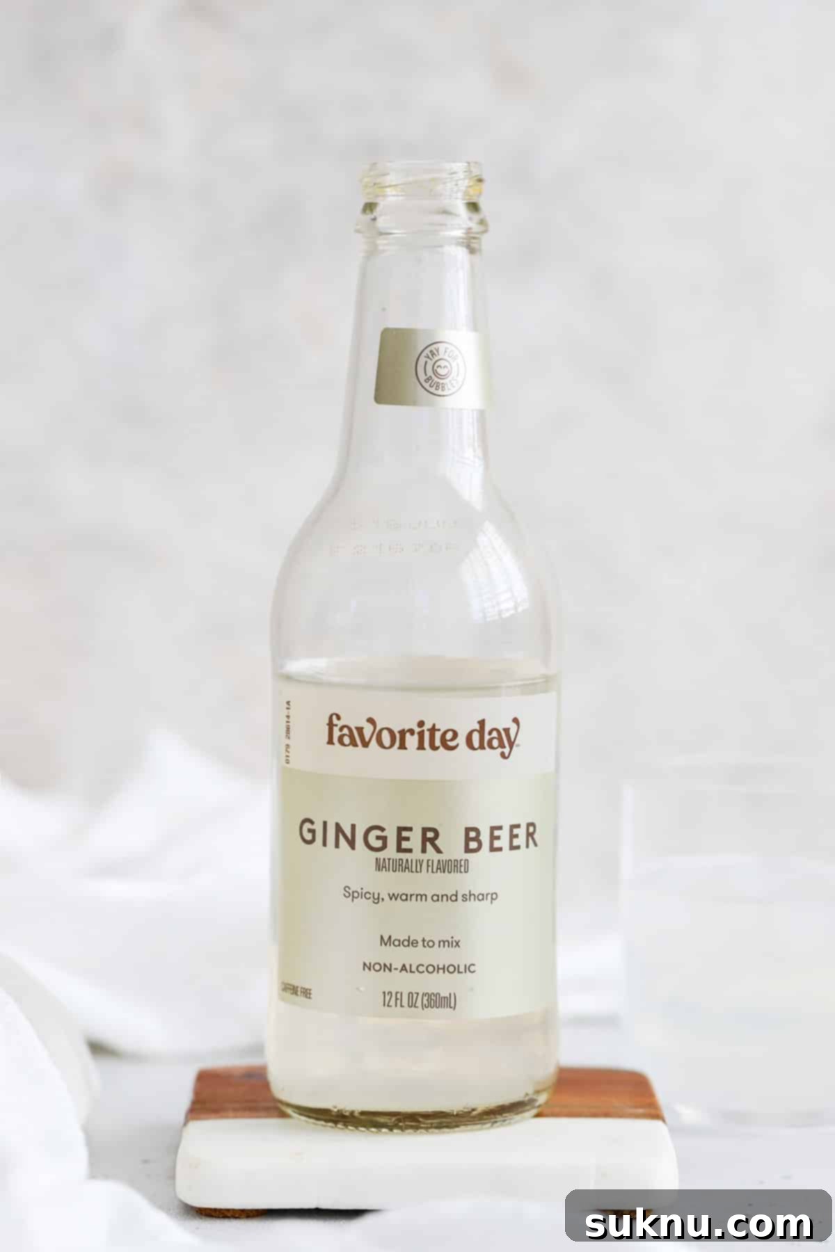 front view of a bottle of favorite day ginger beer