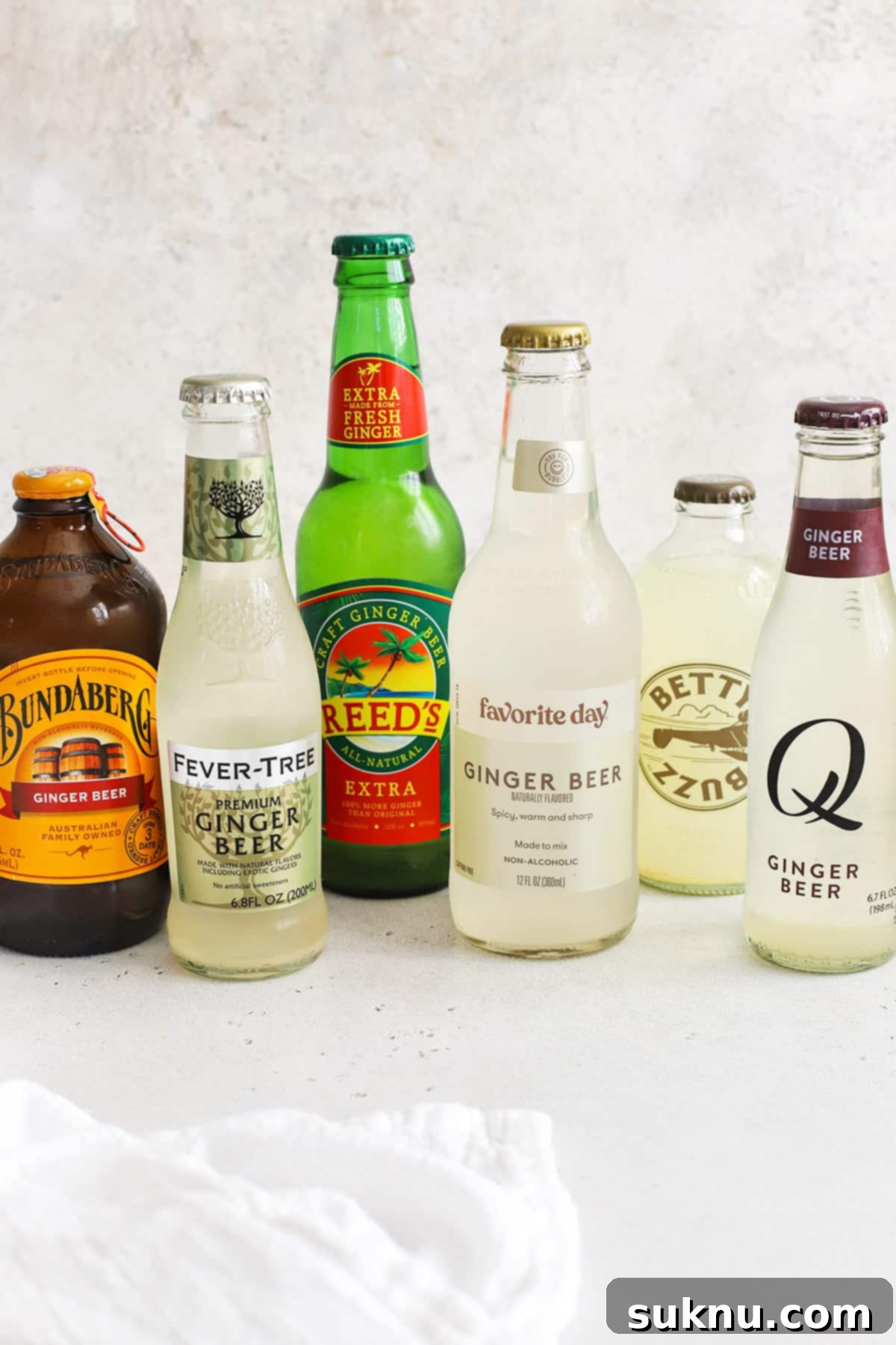 Front view of six brands of ginger beer