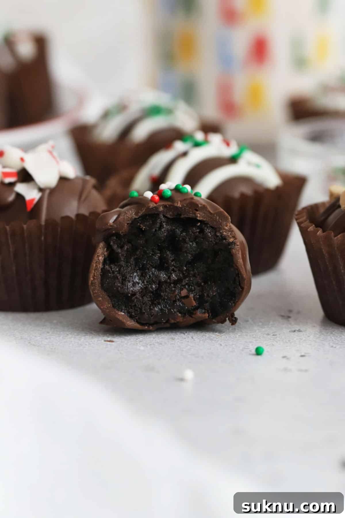 Decadent Gluten-Free Oreo Truffles 8 A gluten-free Oreo truffle with a bite taken out