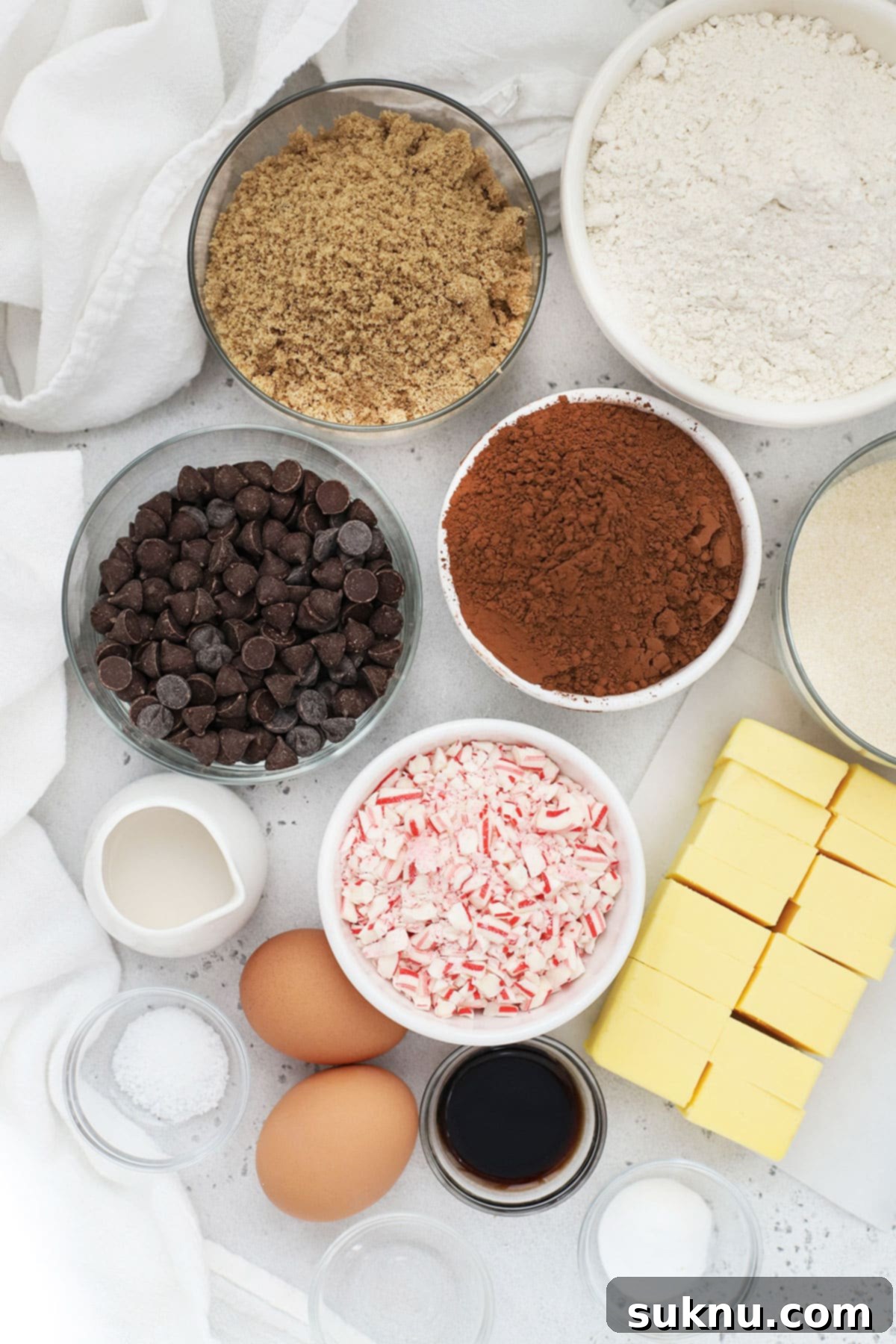 Ingredients for gluten-free chocolate peppermint cookies laid out in small bowls