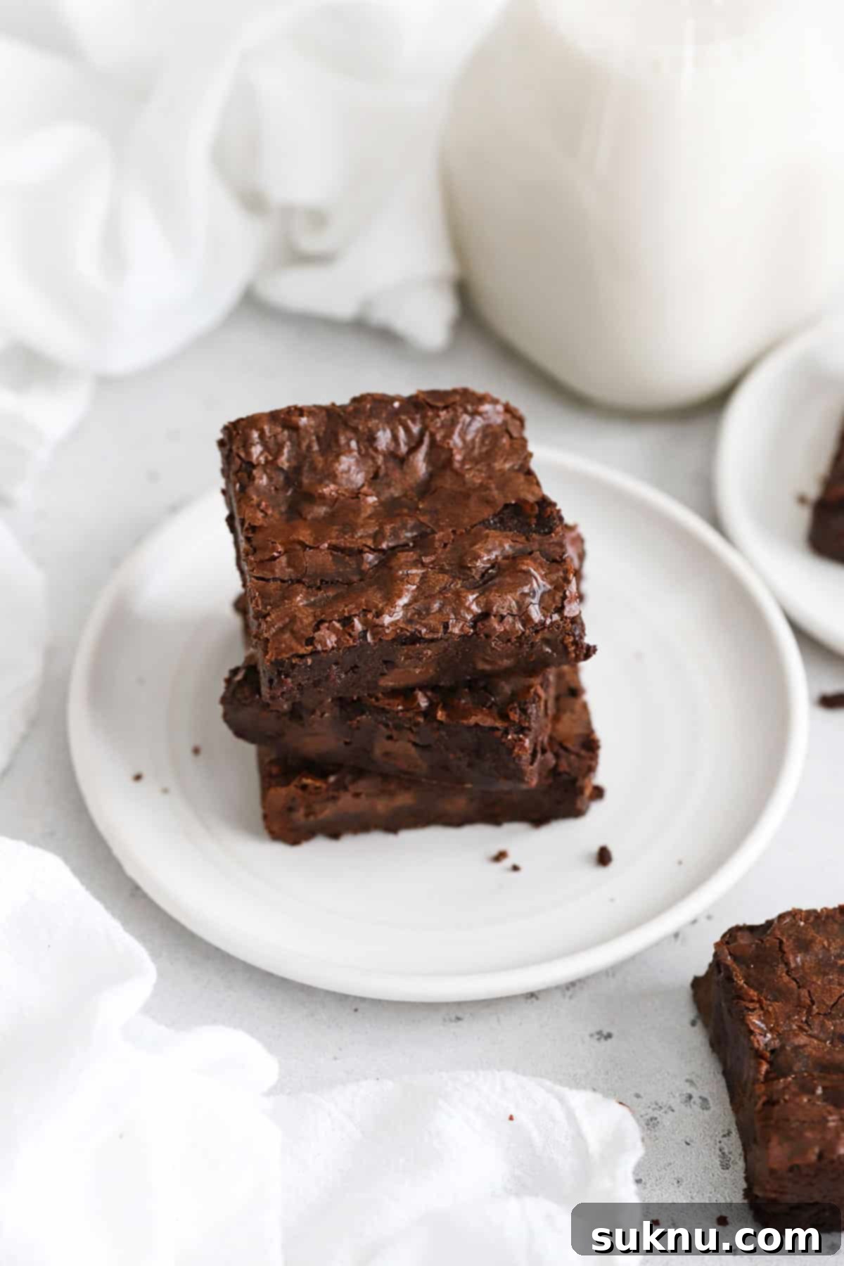 Decadent Fudgy Gluten-Free Vegan Brownies 5 close up of fudgy gluten-free vegan brownies with a shiny, crackly top