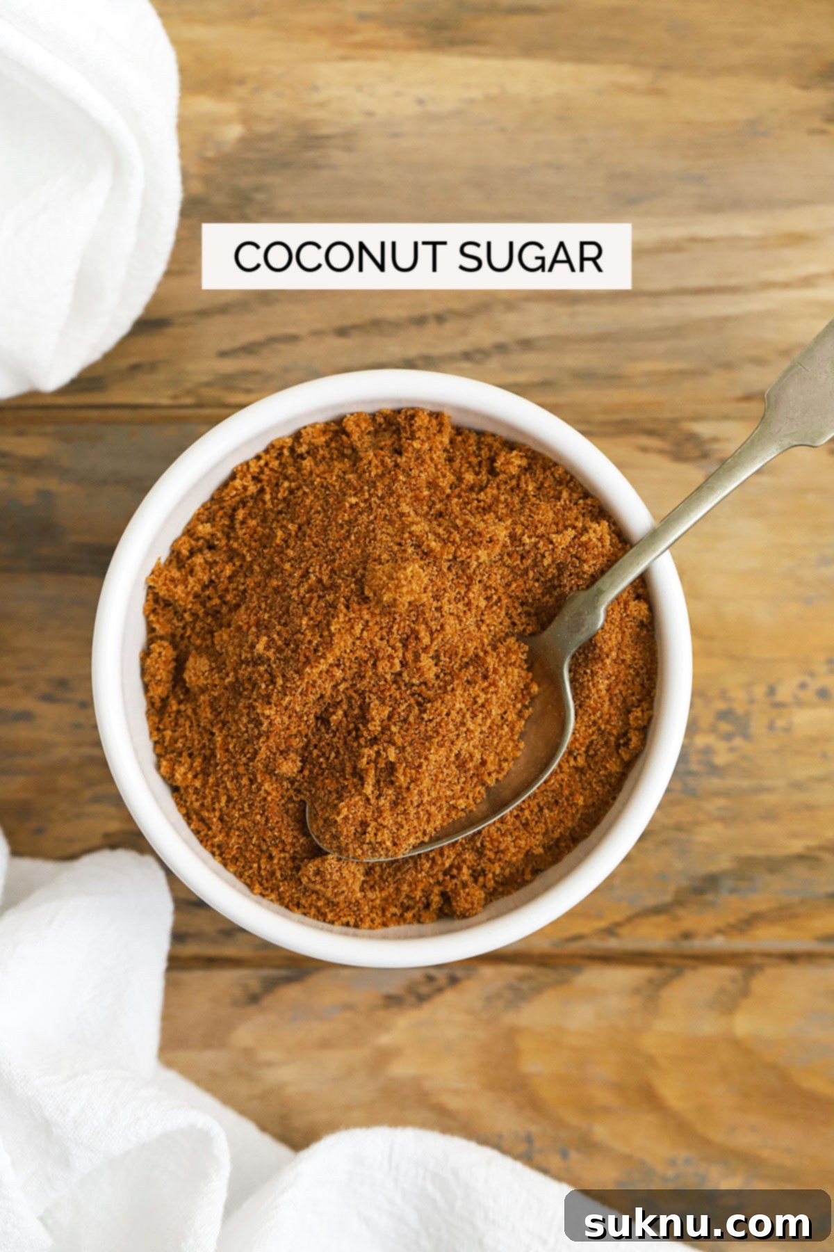 Mastering Sweetness: 12 Sugar Types and Their Culinary Applications 12 coconut sugar in a white bowl