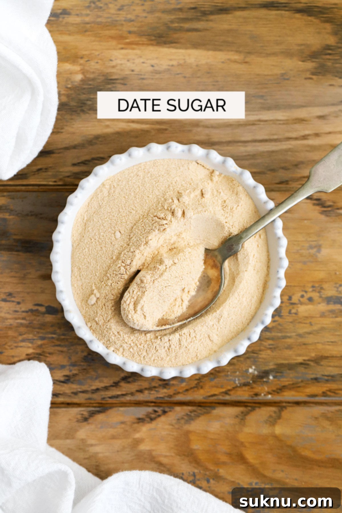 Mastering Sweetness: 12 Sugar Types and Their Culinary Applications 13 date sugar in a white bowl