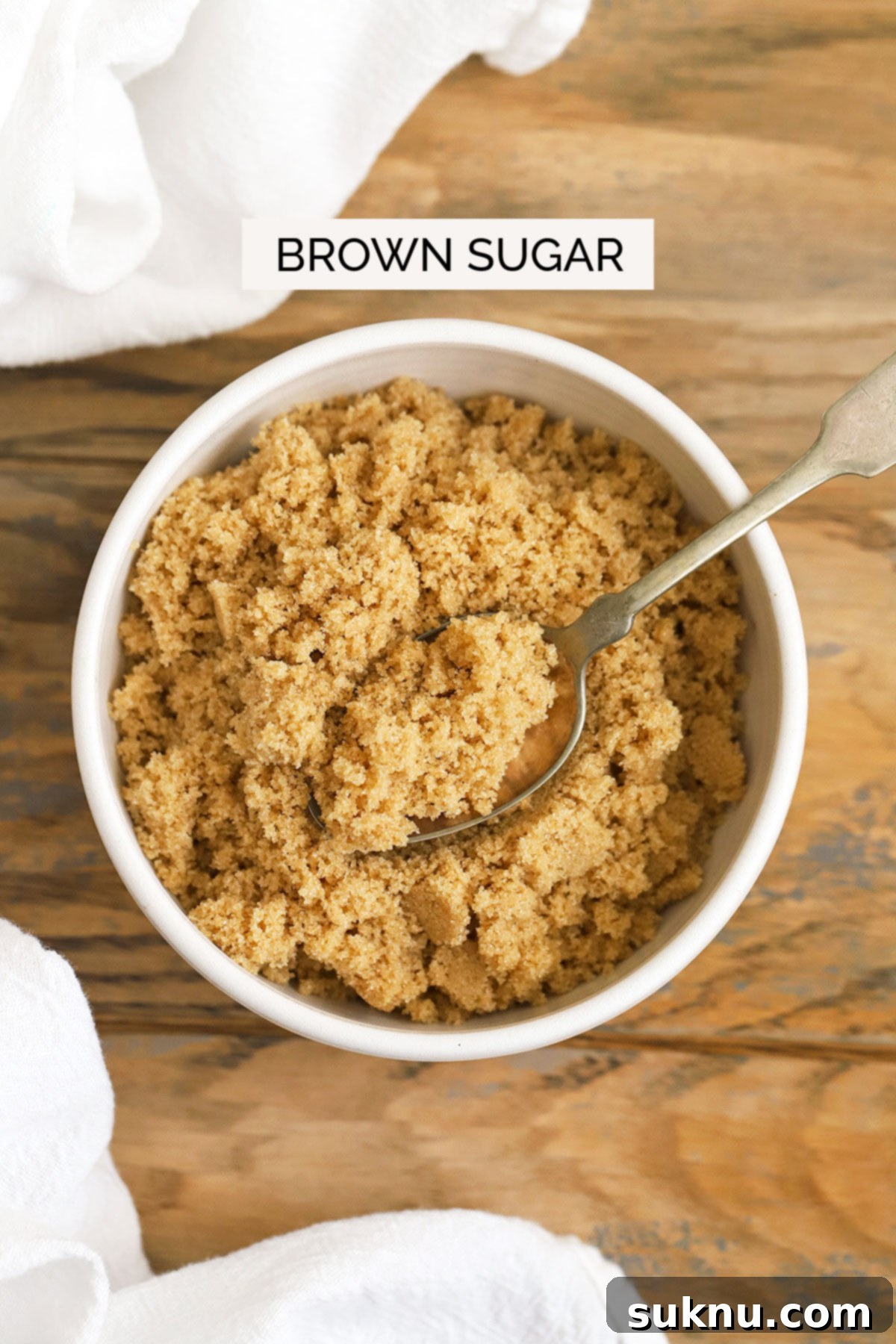 Mastering Sweetness: 12 Sugar Types and Their Culinary Applications 4 light brown sugar in a white bowl