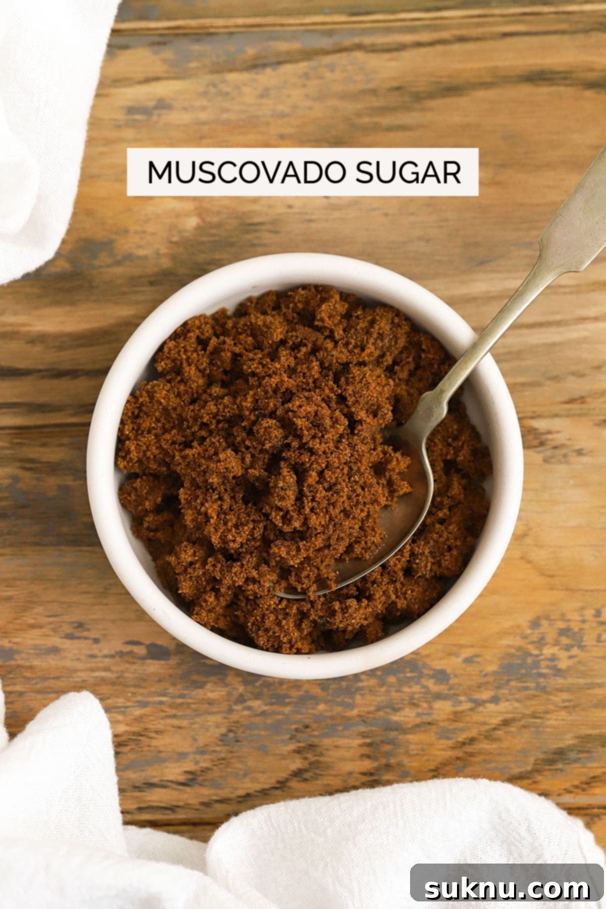 Mastering Sweetness: 12 Sugar Types and Their Culinary Applications 8 muscovado sugar in a white bowl