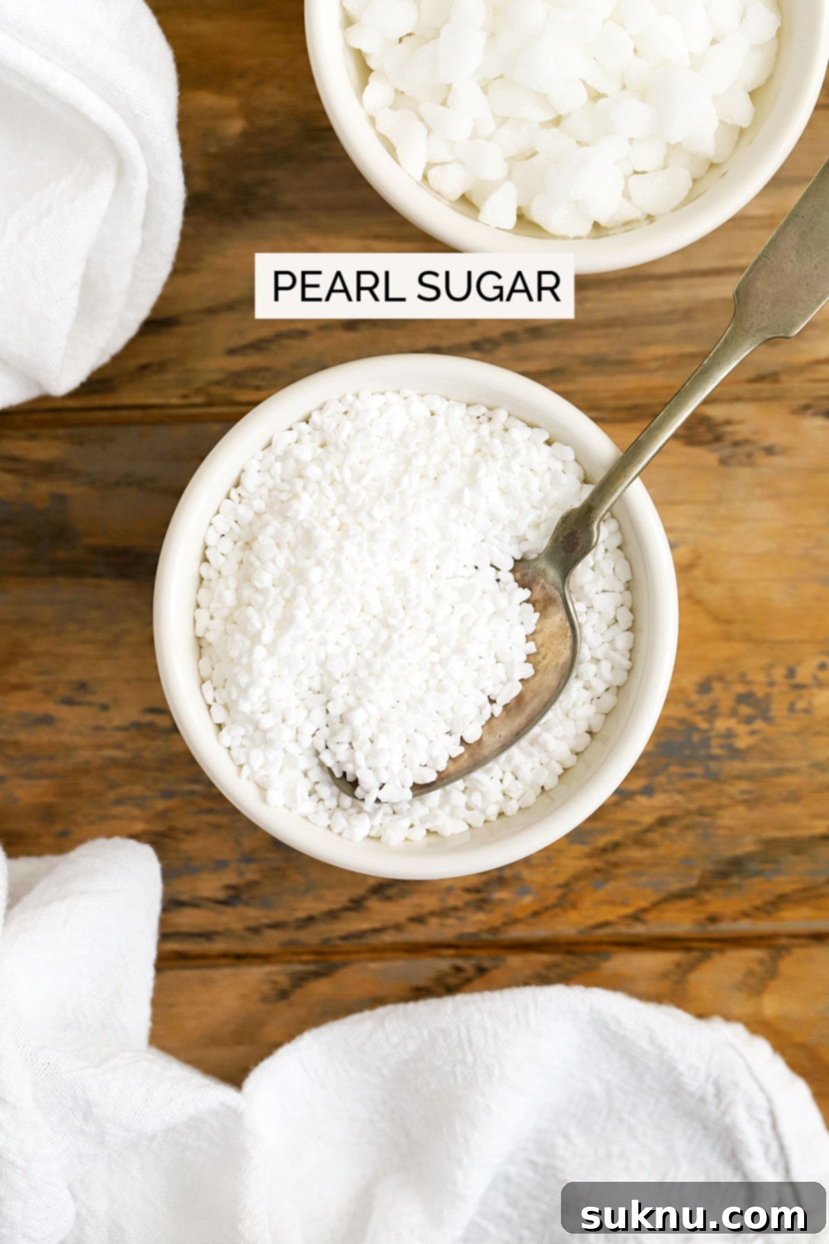 Mastering Sweetness: 12 Sugar Types and Their Culinary Applications 9 pearl sugar in a white bowl