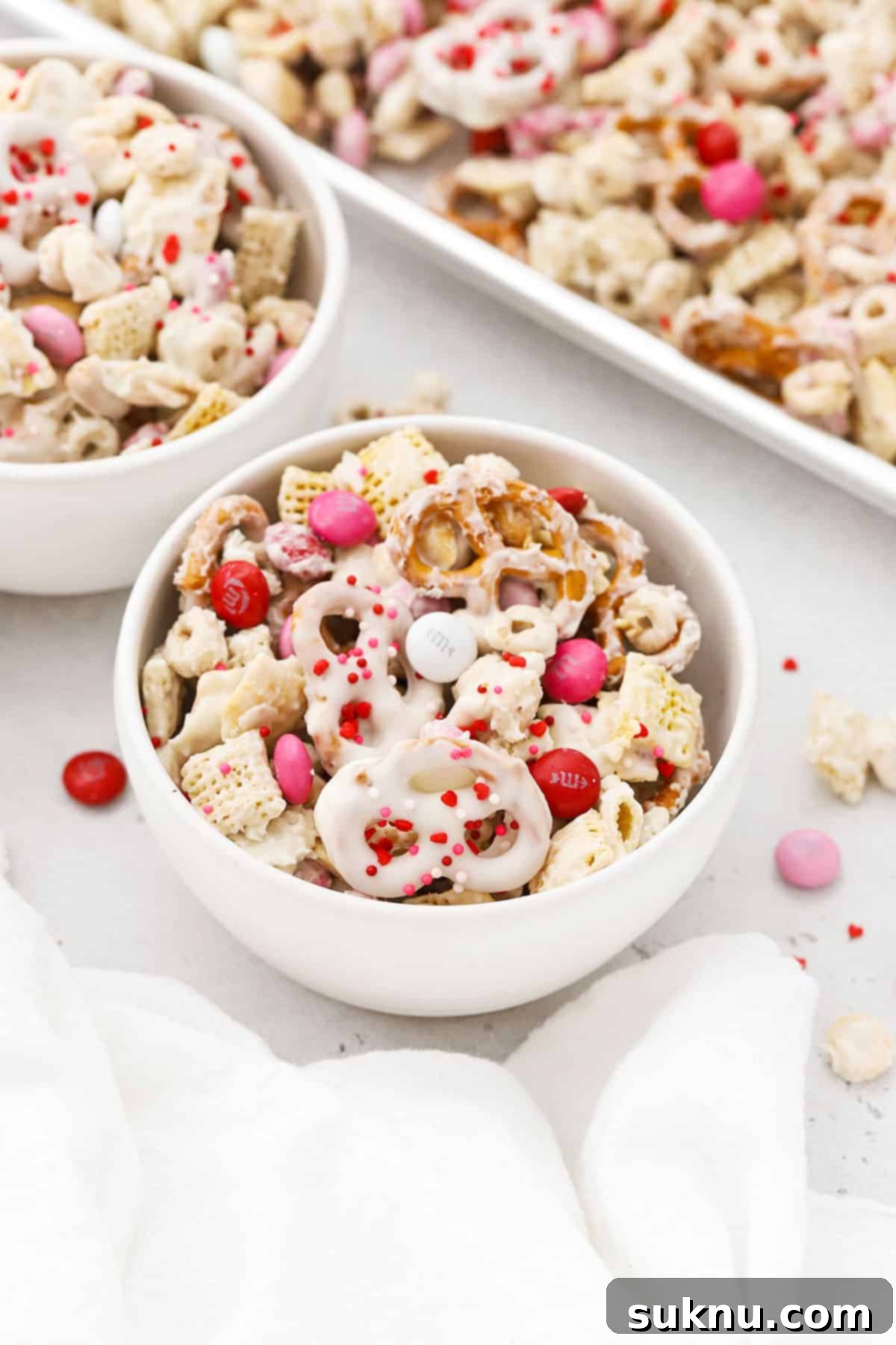 Finished Gluten-free Valentines Chex Mix with extra M&Ms and sprinkles, ready to be enjoyed