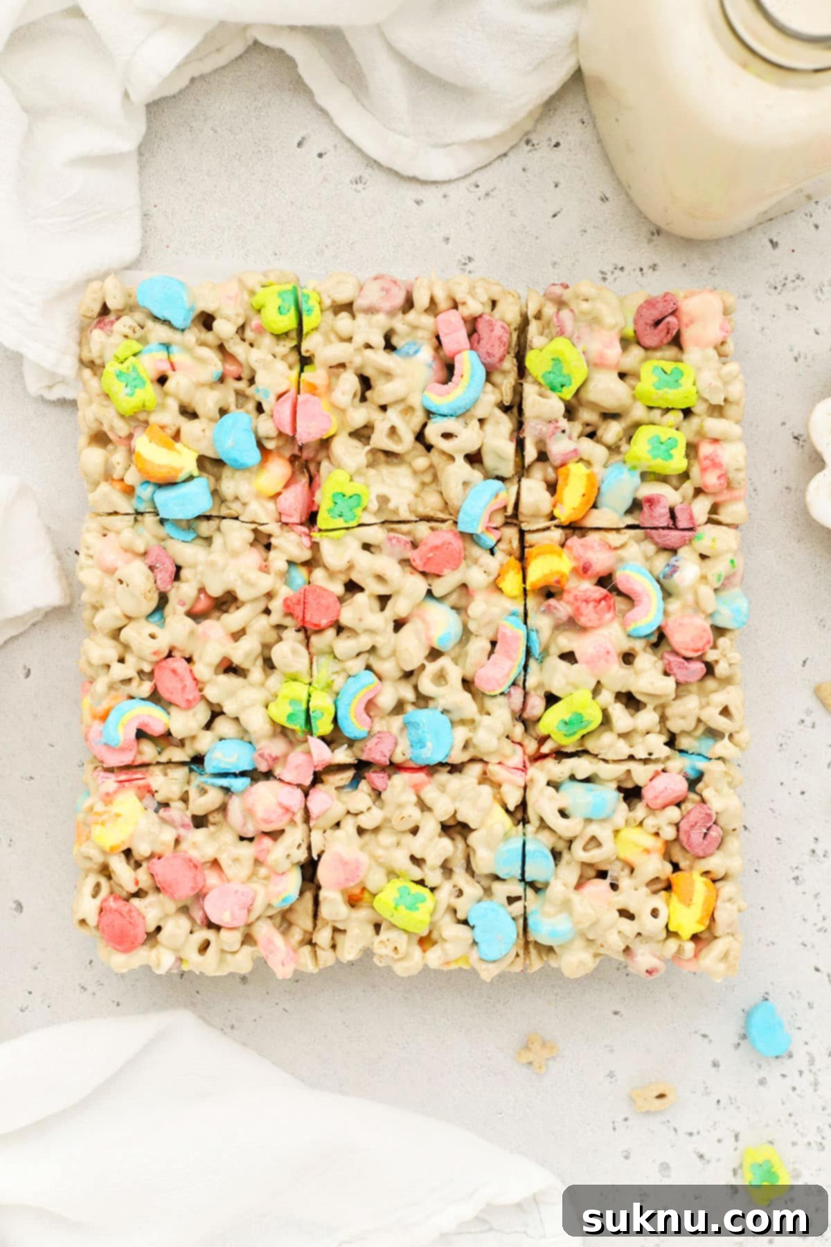Lucky Charms treats cut into squares, showcasing vibrant marshmallows