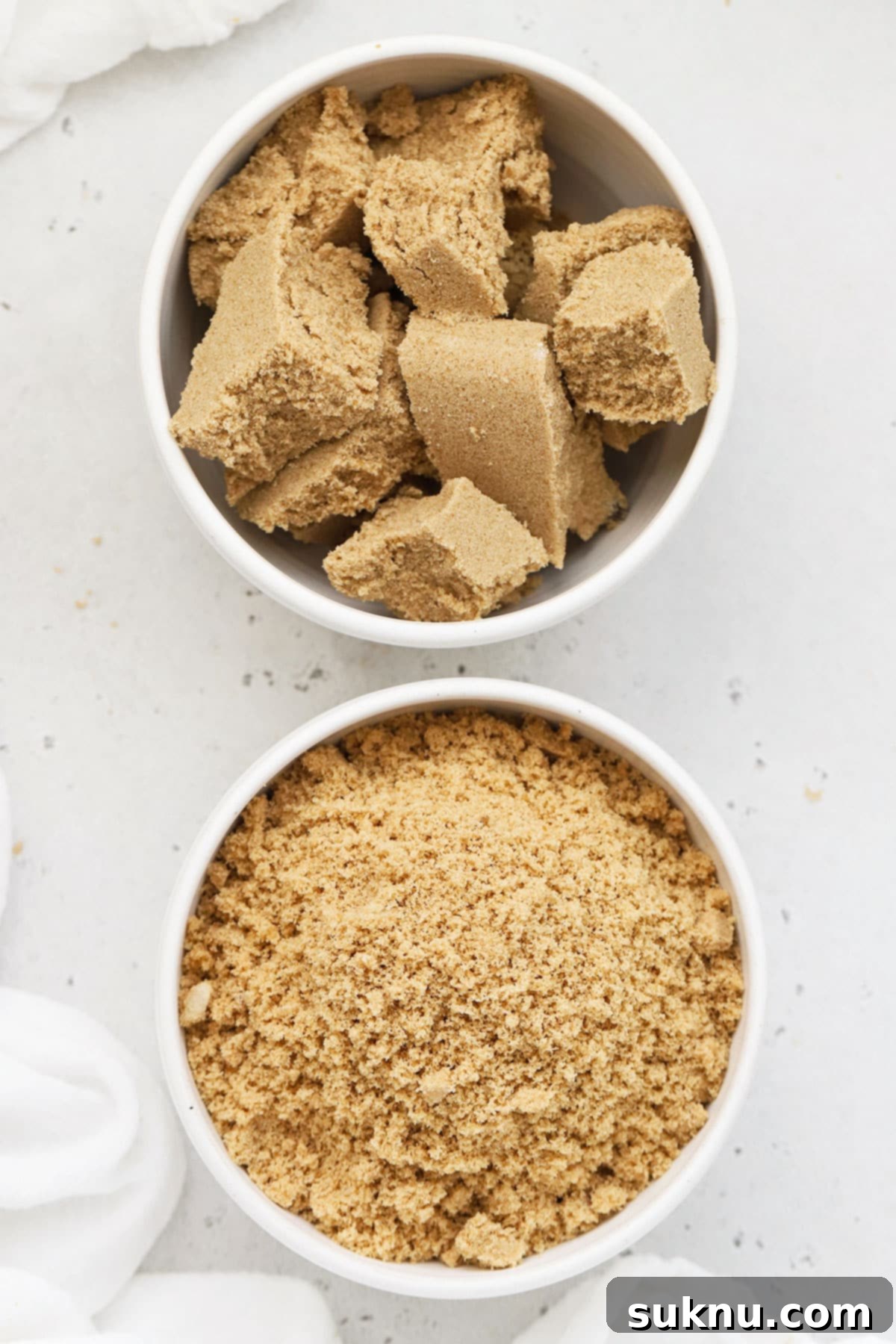 Revive Your Hard Brown Sugar 9 A vibrant comparison of a bowl of hard brown sugar next to a bowl of soft brown sugar, highlighting the success of the softening methods.