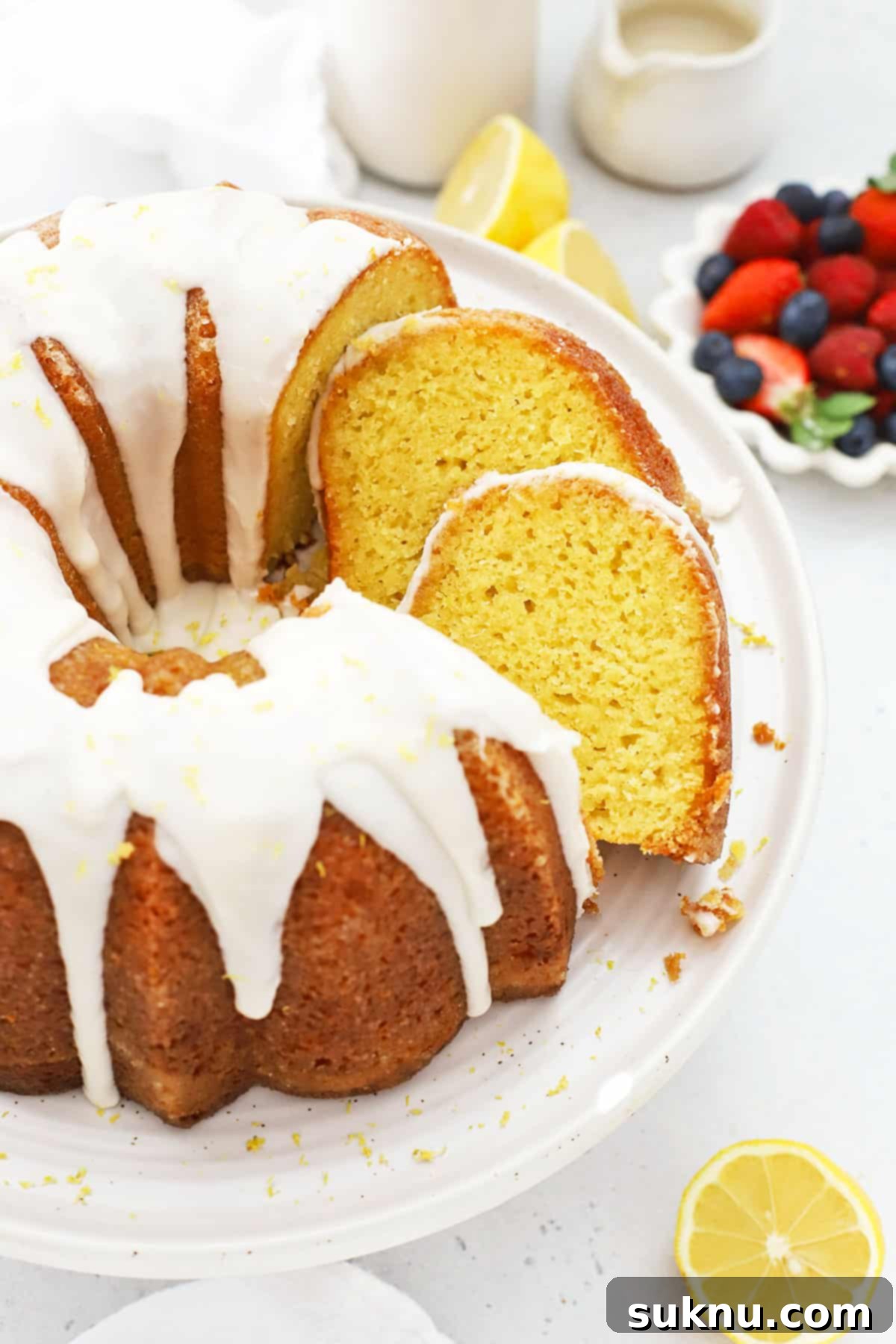 Zesty Gluten-Free Lemon Bundt Cake 7 Beautifully glazed gluten-free lemon bundt cake, ready to be sliced and enjoyed.