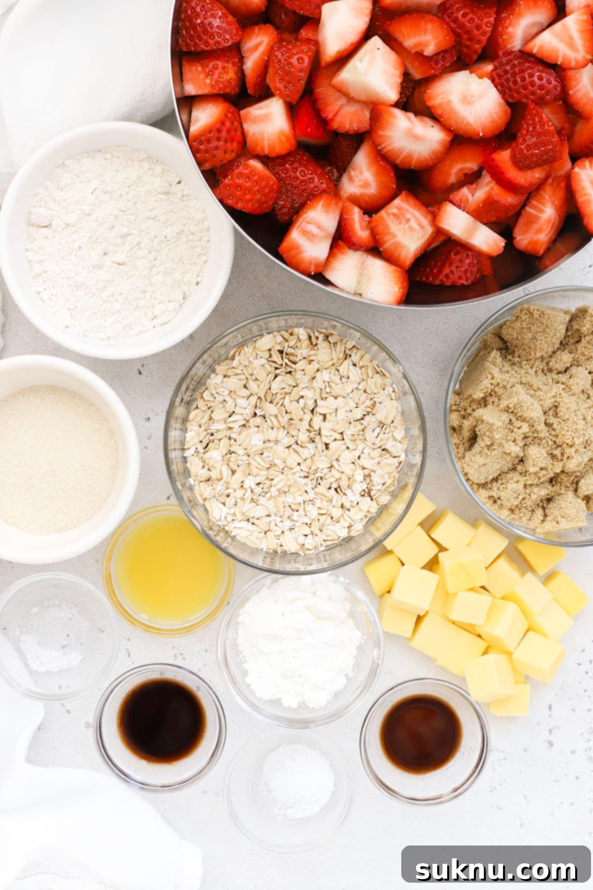 Gluten Free Strawberry Crumble 3 Ingredients laid out for making gluten-free strawberry crisp