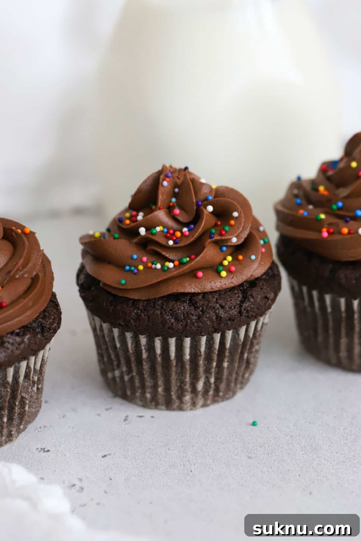 Decadent Gluten-Free Chocolate Buttercream 6 gluten-free chocolate buttercream frosting on gluten-free chocolate cupcakes