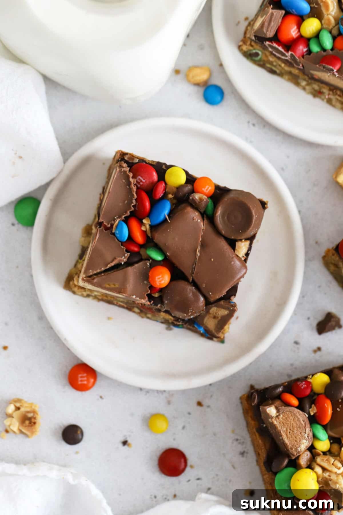 Gluten-Free Candy Cookie Dream Bars 8 leftover halloween candy cookie bars cut into squares