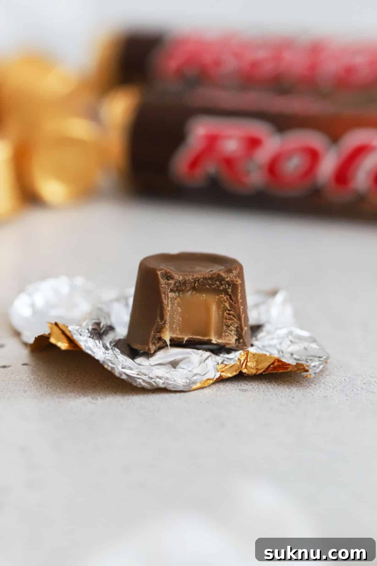 two packages of rolos on a white background with more rolo candy