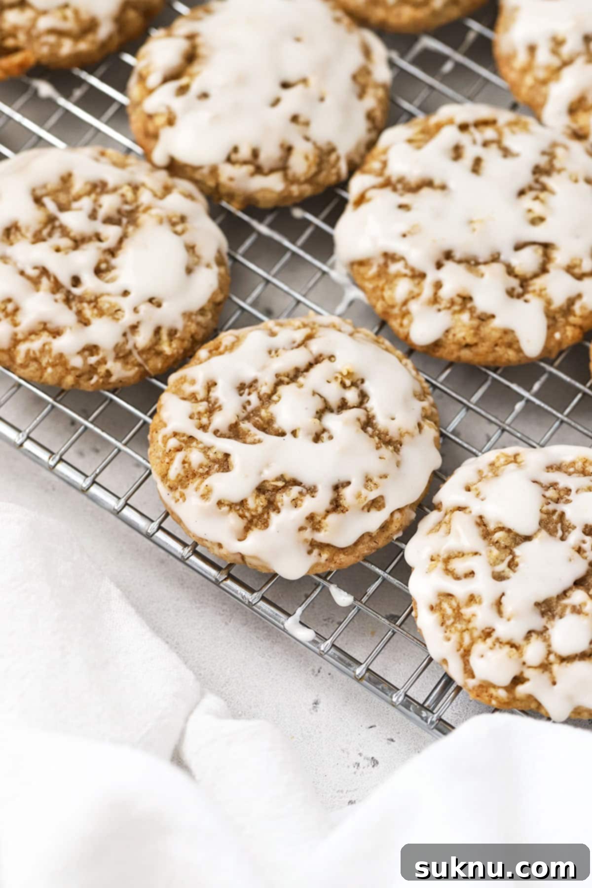 Gluten-Free Iced Oatmeal Cookies cooling on a wire rack