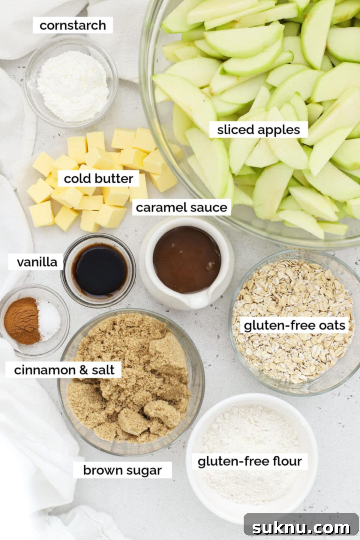 Decadent Gluten-Free Caramel Apple Crisp 3 Ingredients for making gluten-free caramel apple crisp laid out on a surface.