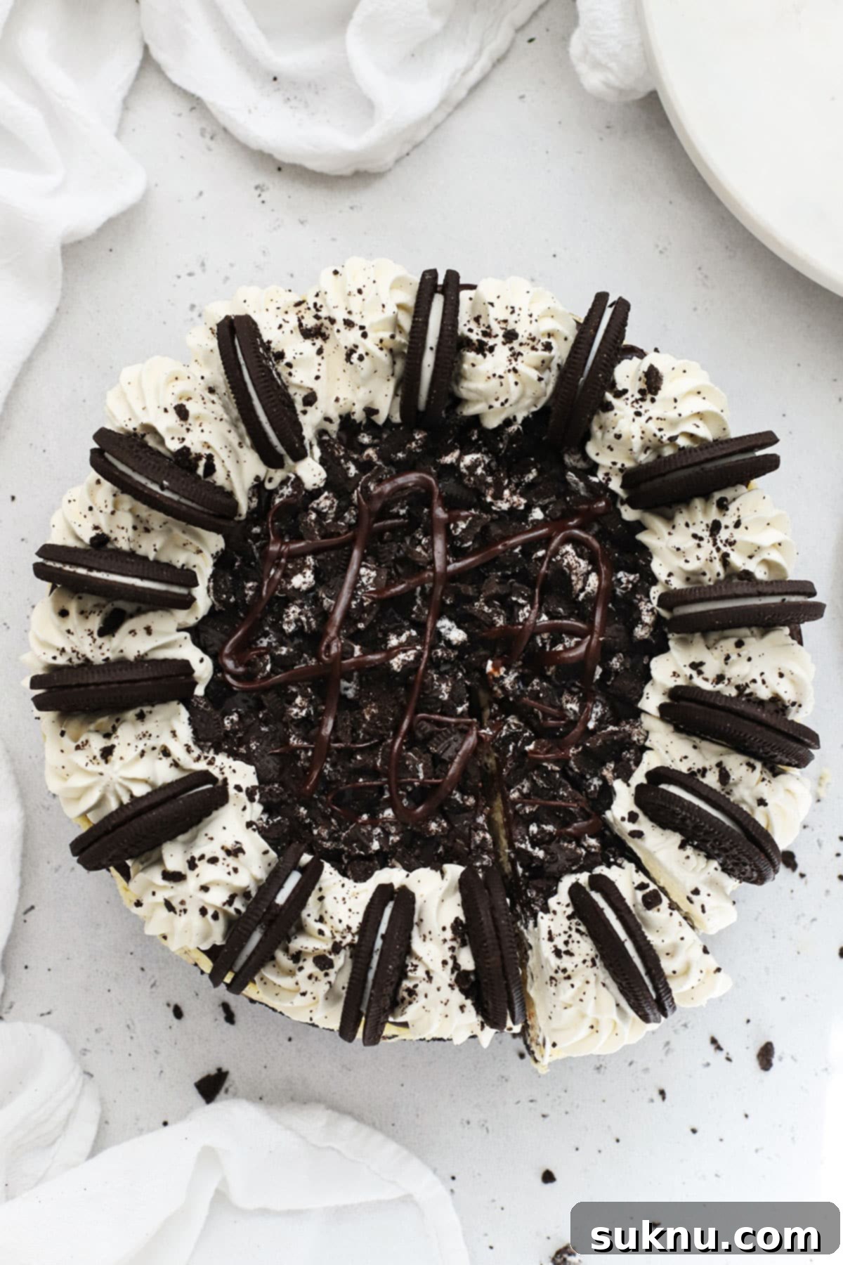 Ultimate Gluten-Free Oreo Cheesecake 8 Whole Gluten-Free Oreo Cheesecake Topped With Whipped Cream Swirls, Chocolate Ganache & Oreo Cookies