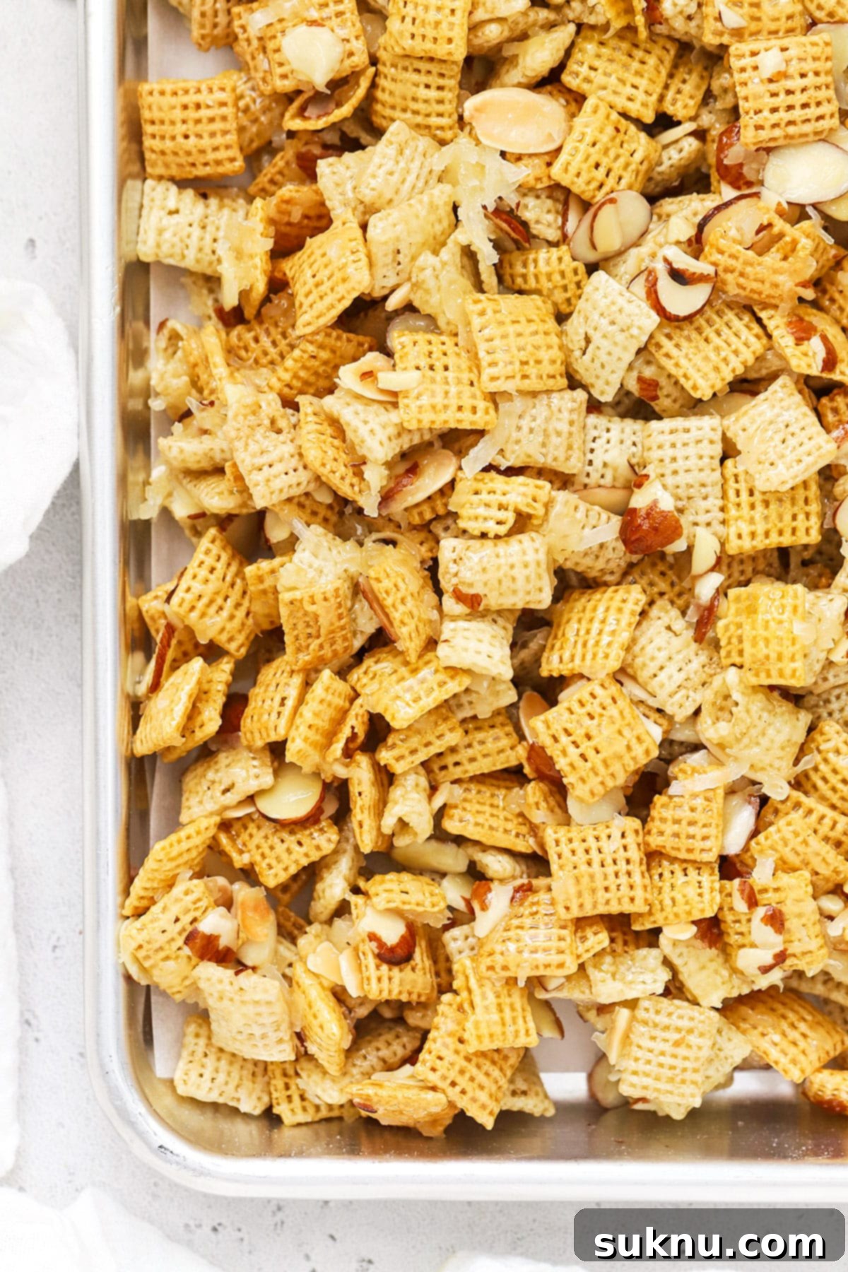 sheet pan of gluten-free sweet chex mix cooling
