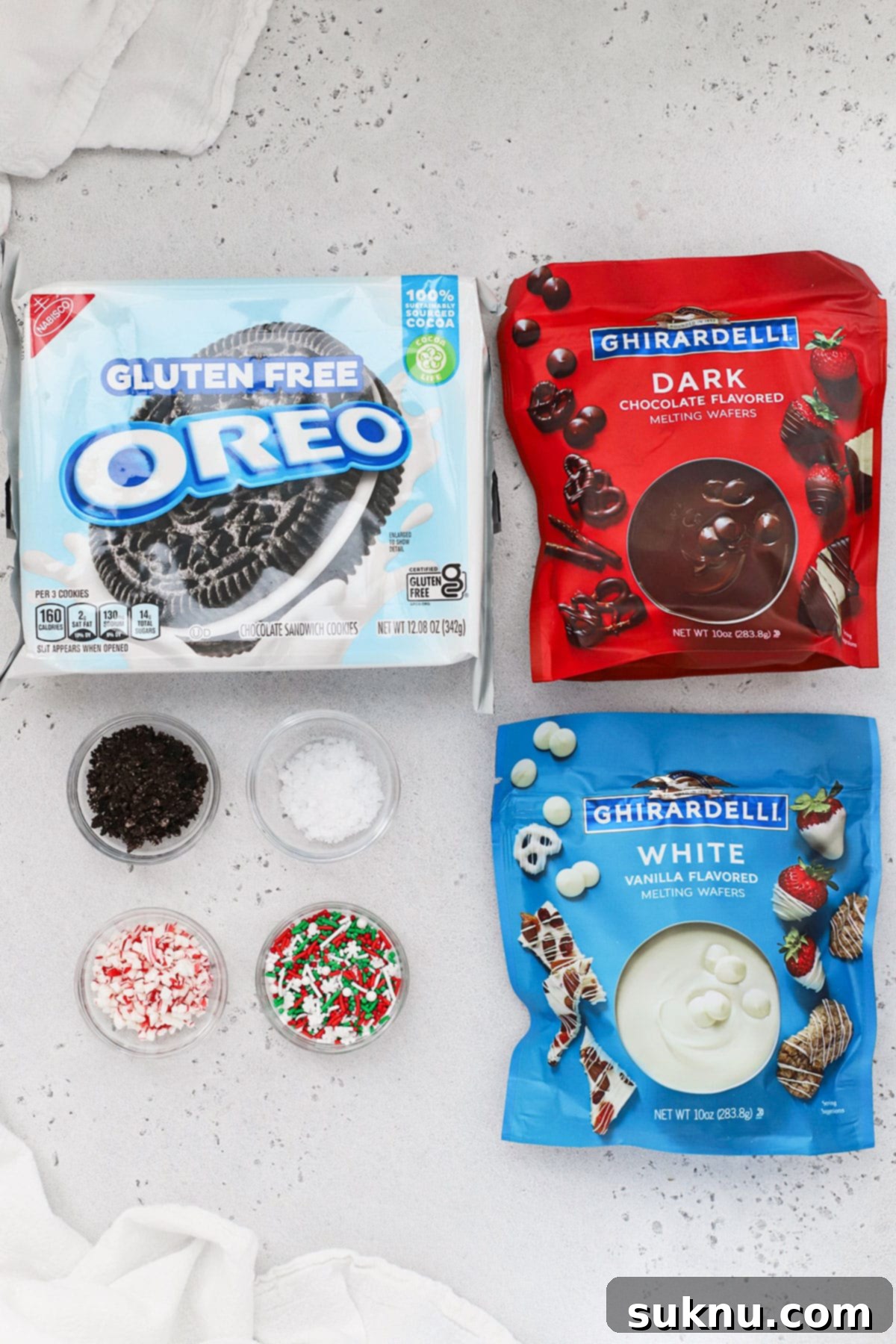 No-Bake Chocolate Dipped Oreos 3 Essential ingredients laid out for making delicious gluten-free chocolate covered Oreos, featuring cookies and chocolate melts.