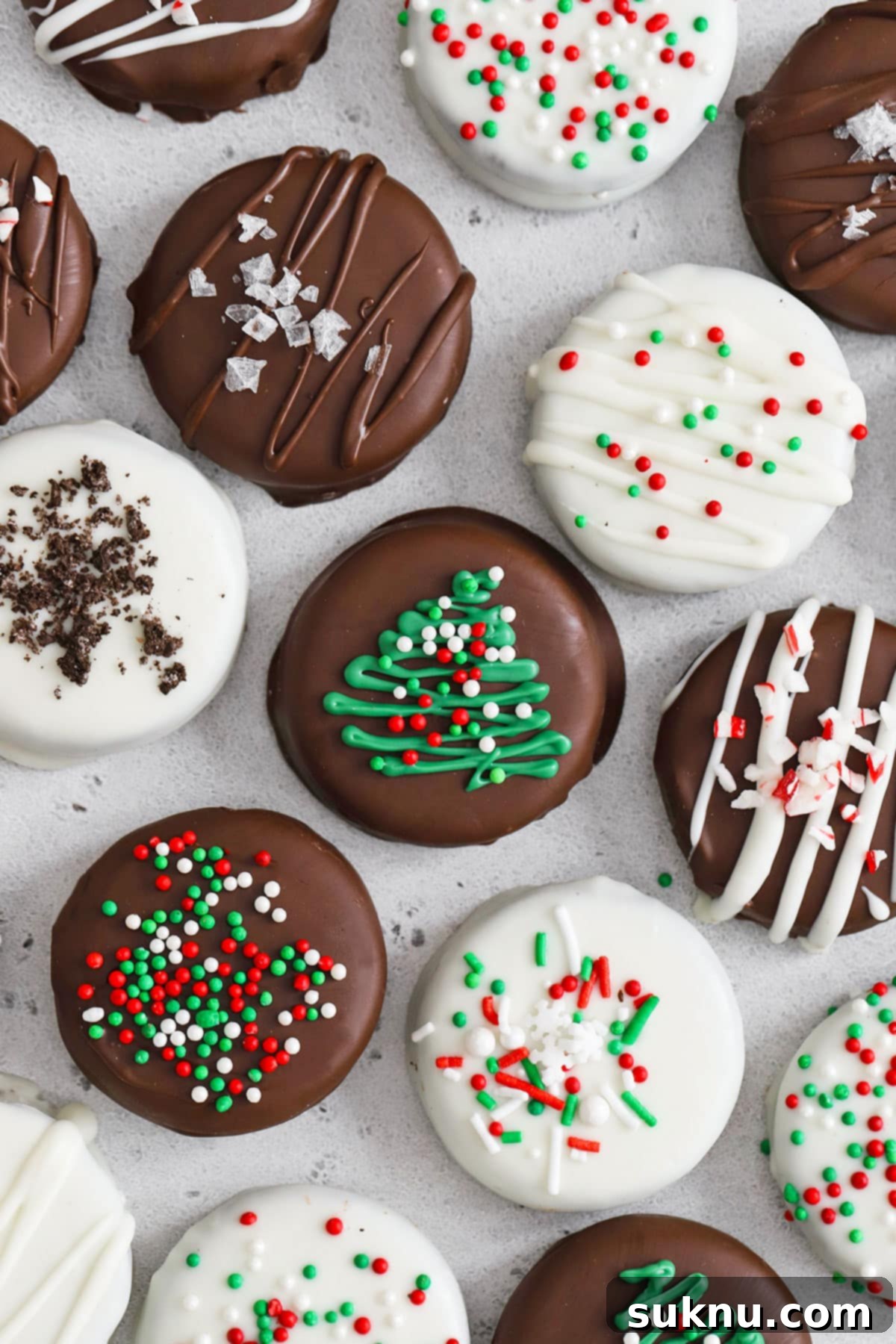 No-Bake Chocolate Dipped Oreos 5 Assortment of gluten-free Christmas chocolate covered Oreos, beautifully decorated with various holiday toppings.
