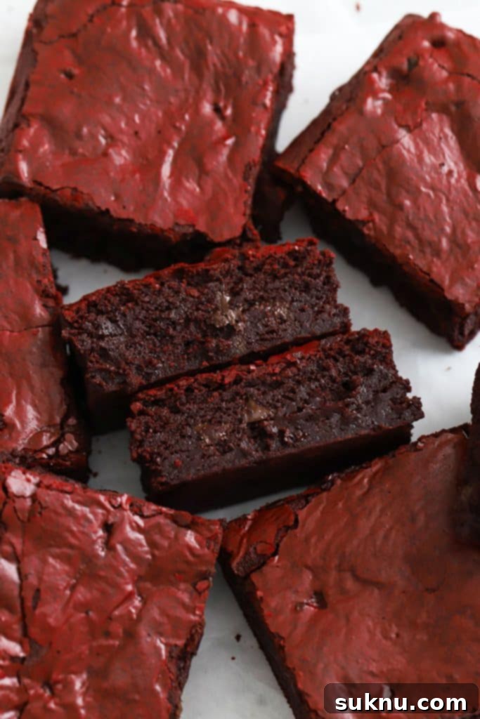 Fudgy gluten-free red velvet brownies with a rich, moist texture, ideal for a decadent dessert.